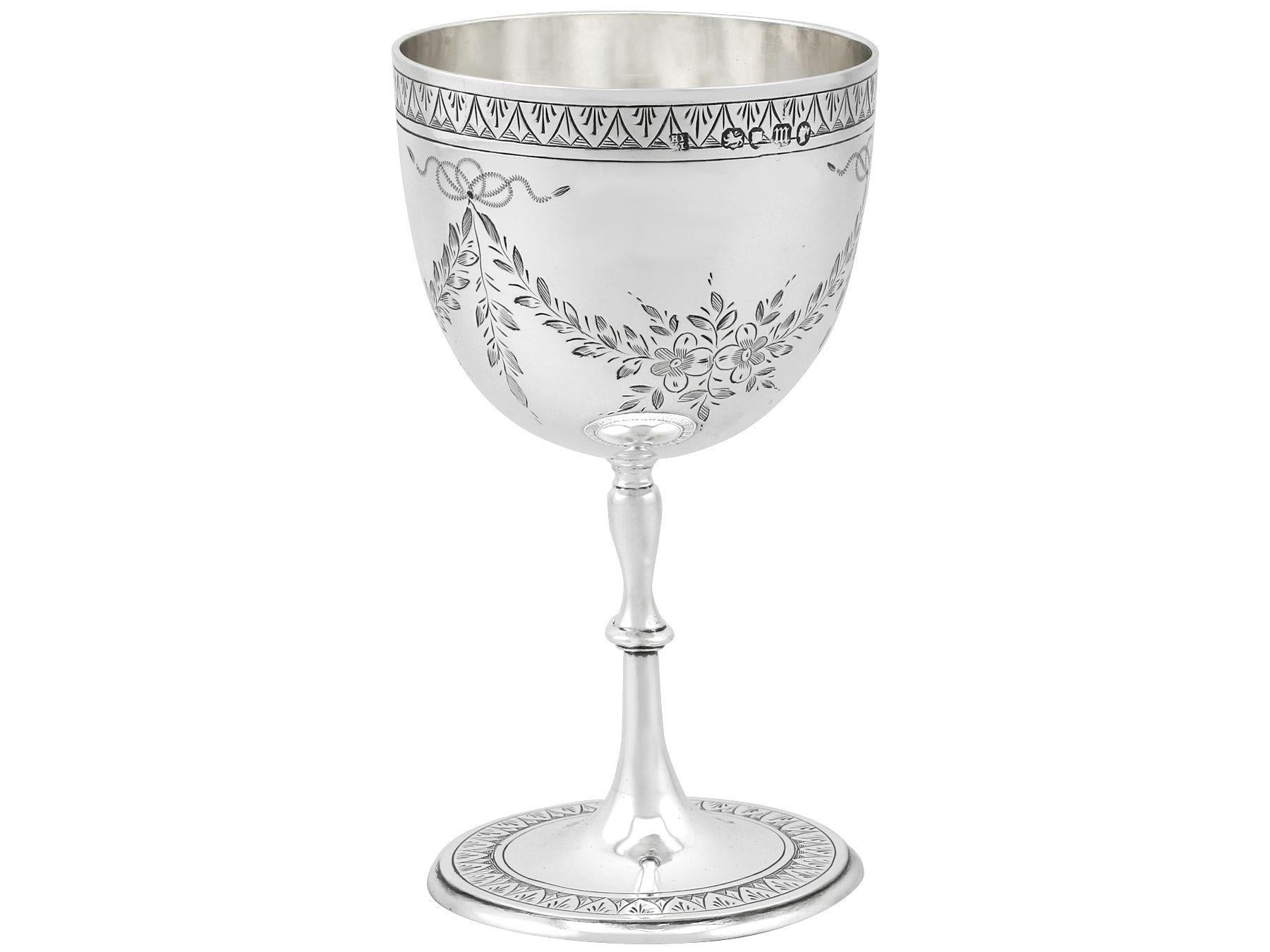 An exceptional, fine and impressive, antique Victorian English sterling silver goblet; an addition to our collection of wine and drinks related silverware.

This exceptional antique Victorian silver goblet, in sterling standard, has a circular