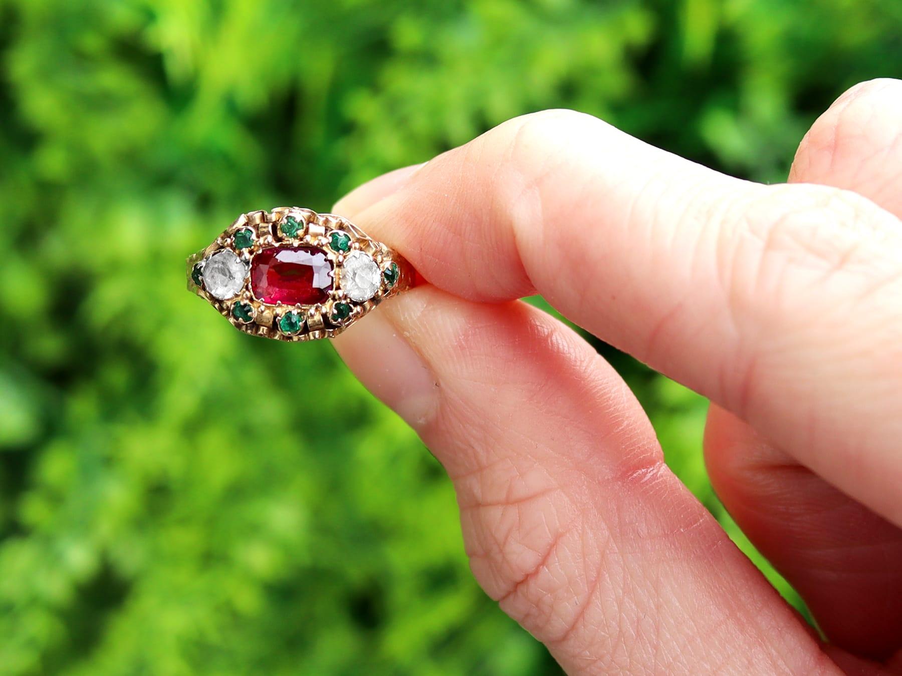 A fine and impressive antique Victorian white, green and red paste, 15 karat yellow gold cannetille style dress ring; part of our diverse antique jewelry collections.

This fine and impressive antique paste ring has been crafted in 15k yellow