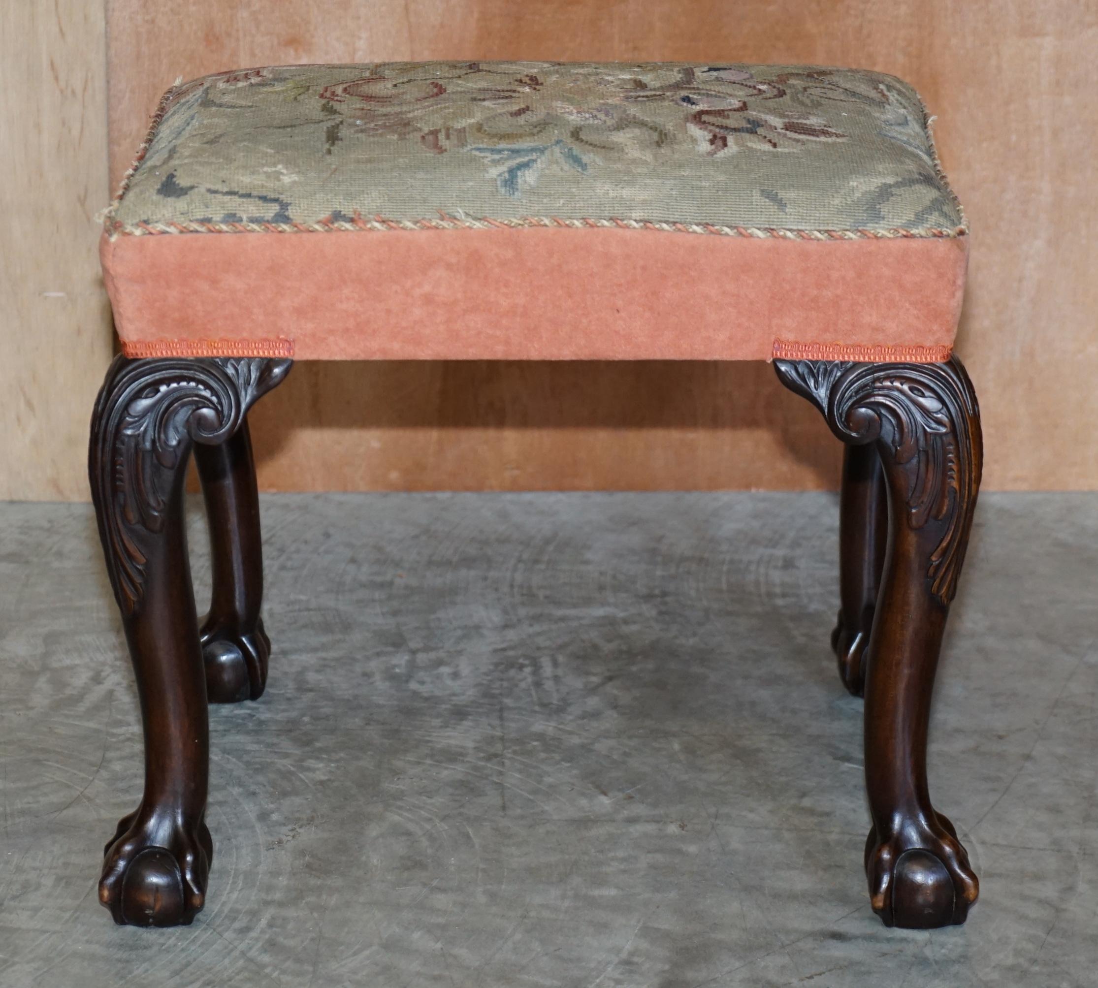 We are delighted to offer for sale this lovely original Victorian hand carved Claw & Ball Cabriolet legged stool based on a George III design

A very decorative and well made piece, the top has a period Victorian embroidery on of flowers, the legs