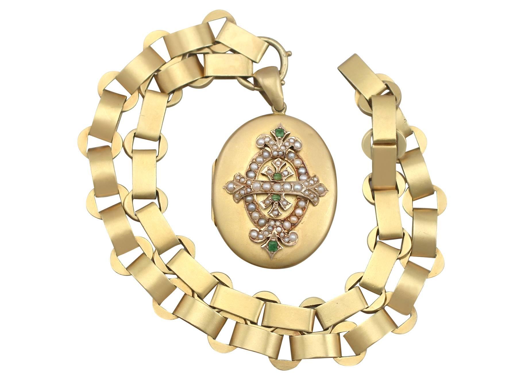 An exceptional Victorian 0.15 carat emerald and seed pearl, 15 karat yellow gold locket and chain; part of our diverse antique jewelry and estate jewelry collections.

This exceptional, fine and impressive Victorian locket and chain has been crafted