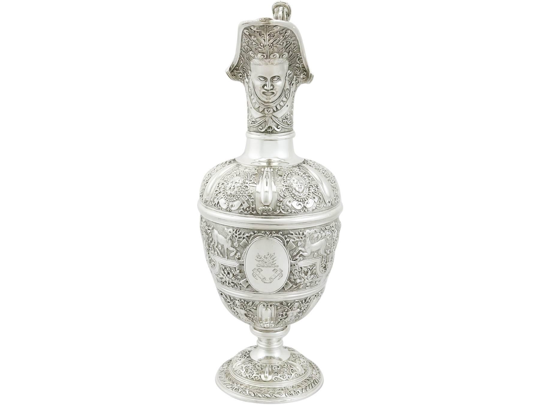 An exceptional, fine and impressive antique Victorian English sterling silver Cellini style claret jug made by Elkington & Co; an addition to our silver jug collection

This exceptional antique Victorian English sterling silver Cellini style