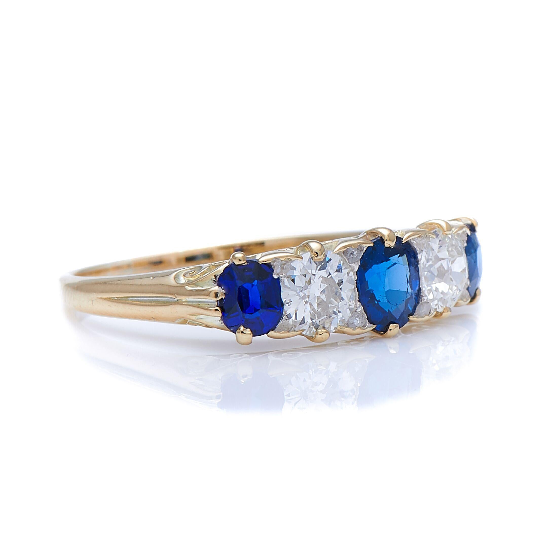 Diamond and sapphire ring, late 19th century. This classic five-stone ring is set with a well-matched sequence of deep blue sapphires and circular-cut diamonds, the junctions between thee stones cleverly filled with tiny rose diamonds. The metal