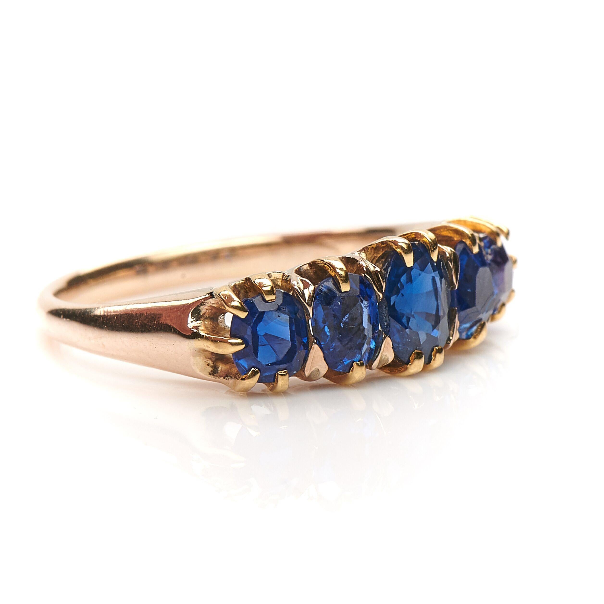 Victorian, sapphire five stone ring, circa 1890. Horizontally set with five old cushion shape sapphires in a simple 18ct yellow gold claw setting. The sapphires are a wonderful mid-blue colour with a lots of character and life. The unadulterated