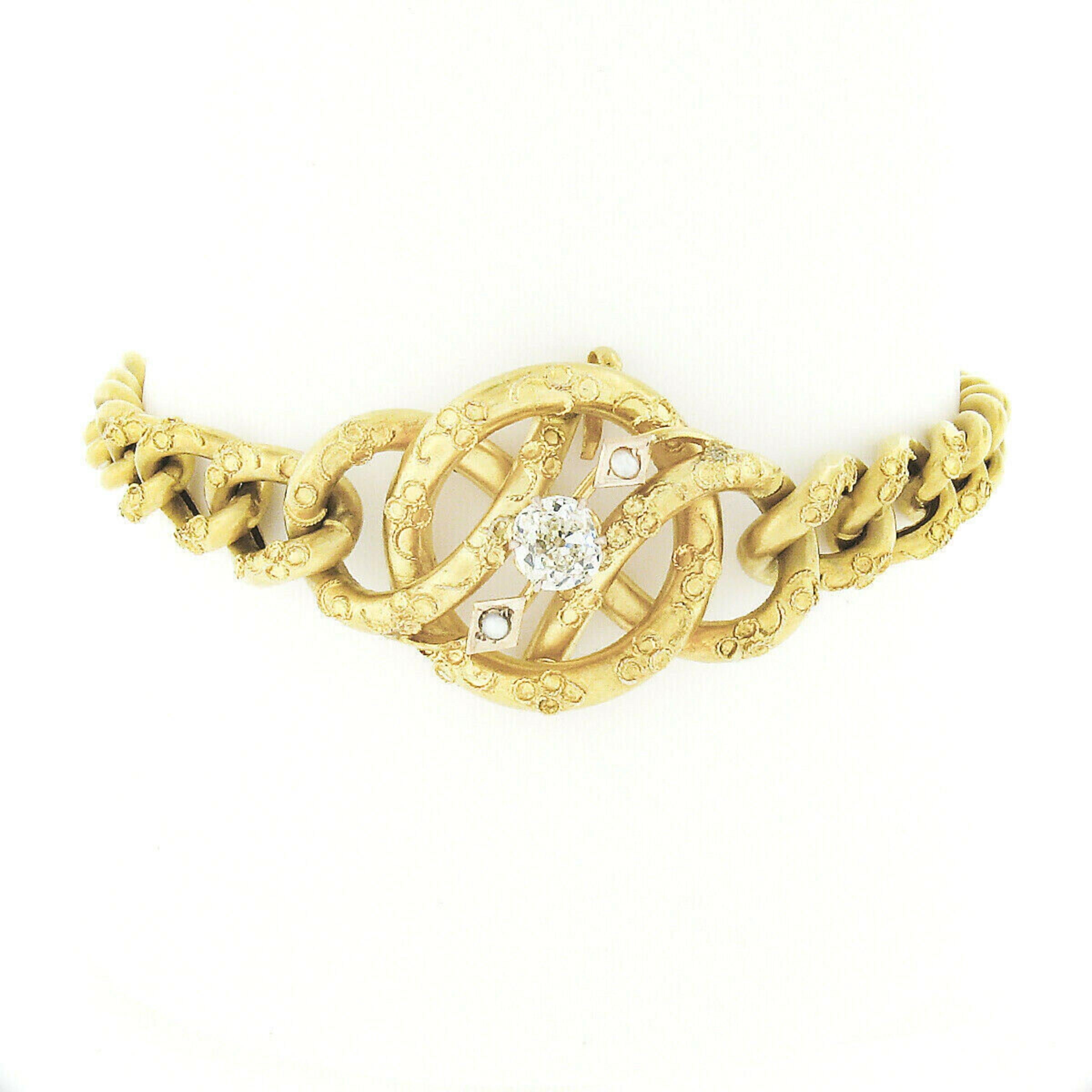 This magnificent antique bracelet was crafted in solid 18k yellow gold during the Victorian era. The top of the bracelet features an elegant tube work design that is decorated with an adorable floral wire work pattern and neatly set with a GIA