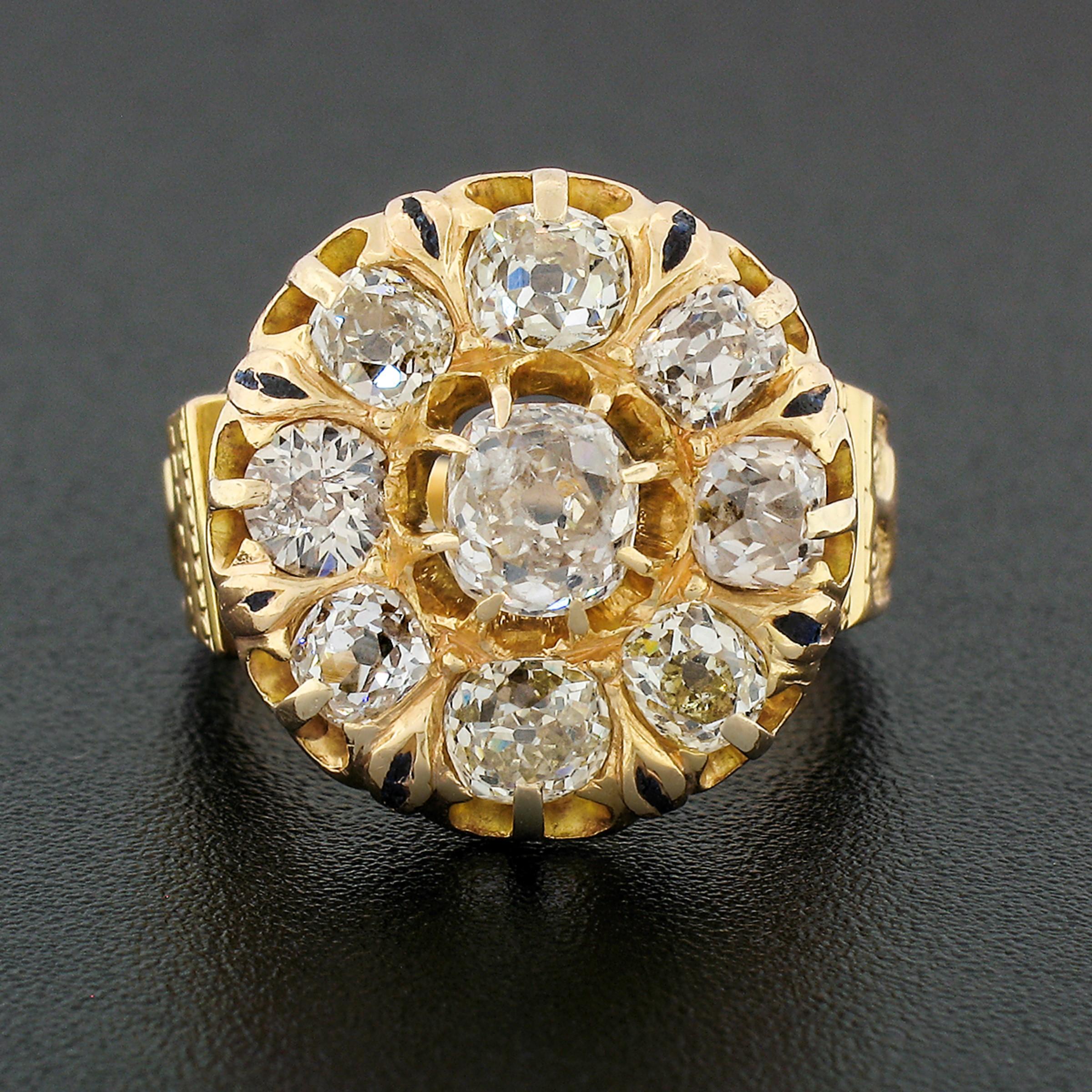 Here we have a magnificent antique diamond platter ring crafted from solid 18k yellow gold during the Victorian era. The ring features an approximately 0.65 carat old mine cut diamond 8-prong set at its center. It is a fine quality stone with