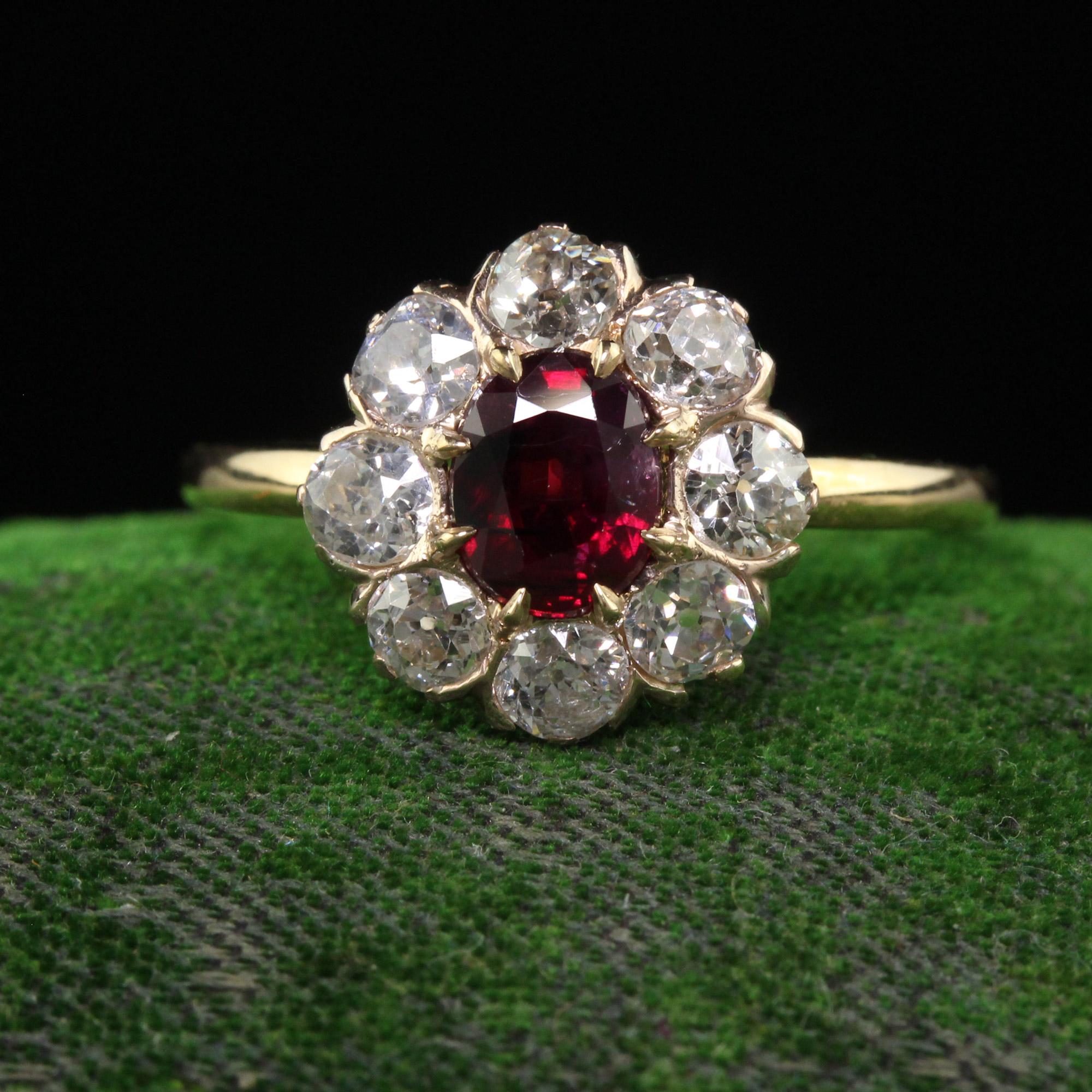 Beautiful Antique Victorian 18K Gold Burma Ruby Diamond Cluster Engagement Ring - GIA. This gorgeous Victorian ruby and diamond engagement ring is crafted in 18k yellow gold. The ring features a natural unheated Burmese ruby that has a GIA report