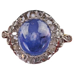 Antiguo anillo de compromiso victoriano de oro de 18 quilates con diamantes talla rosa y zafiro en cabujón