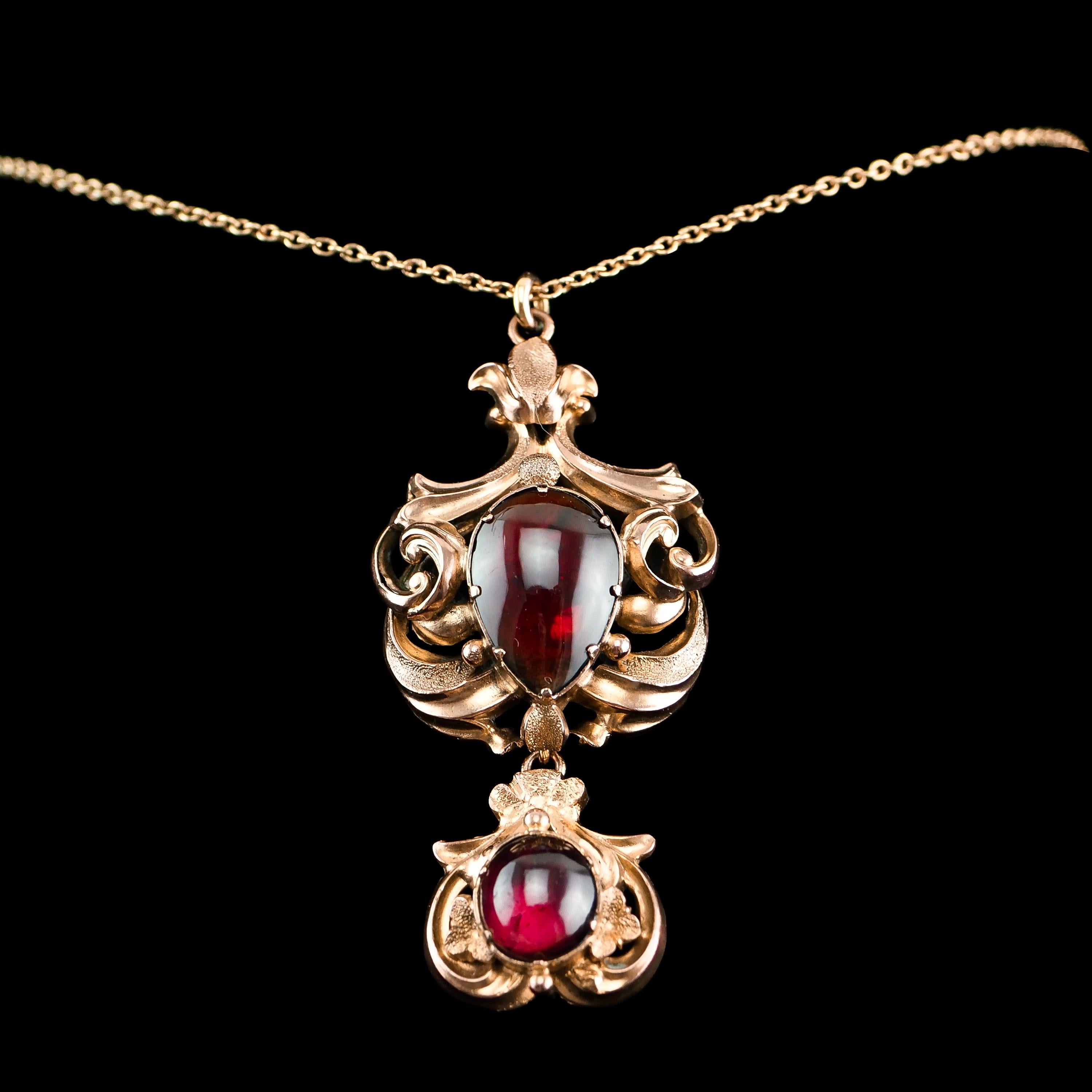We are delighted to offer this magnificent 18k gold garnet necklace made in the early Victorian period c.1840.

The necklace is made from high-carat gold (18K+ tested) and presents an exceptional ornate and regal design featuring multiple layers of