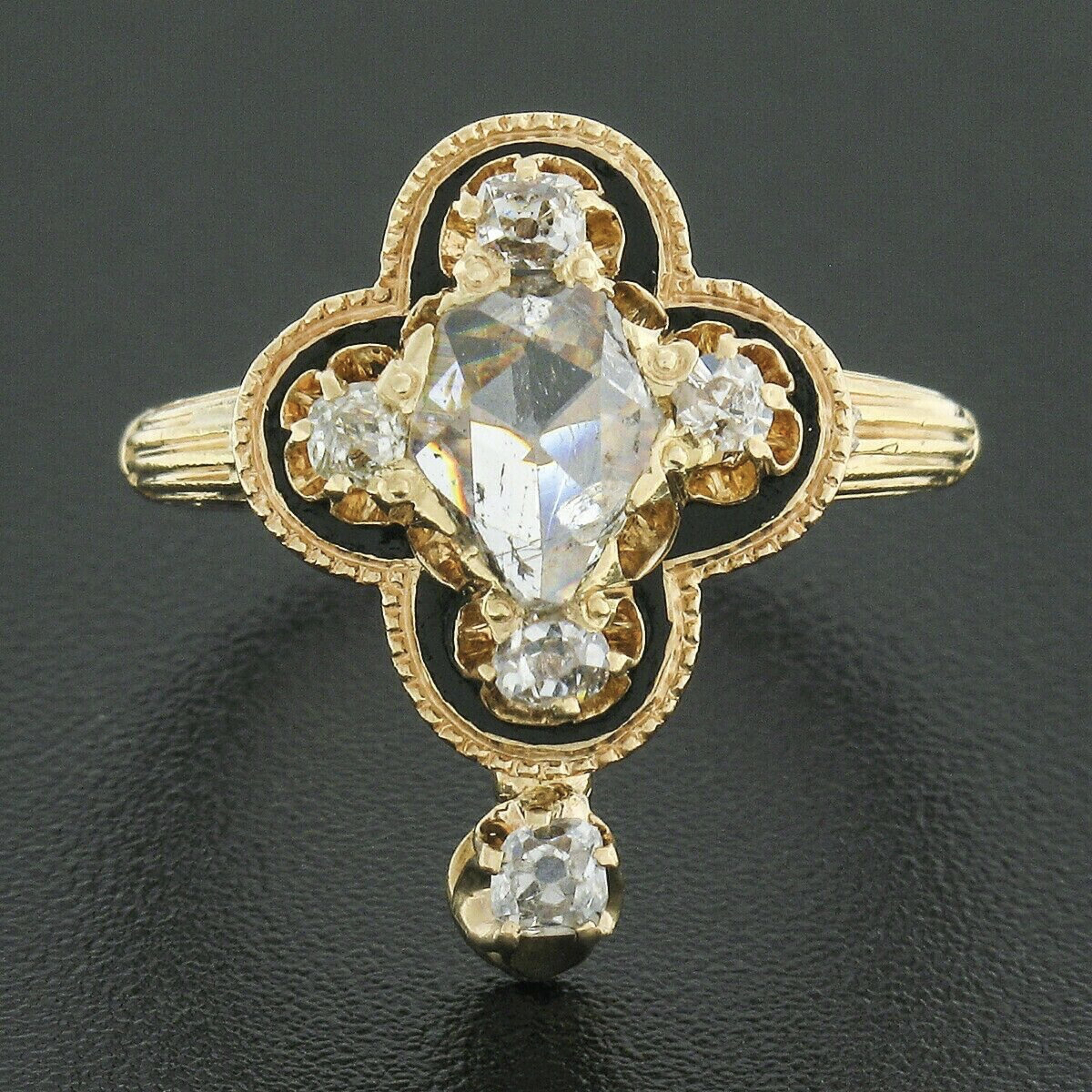 Here we have a gorgeous and unique-looking antique ring crafted from solid 14k yellow gold during the Victorian era. It features a spectacular quatrefoil design set with a fine quality pear-shaped rose cut diamond solitaire at its center, weighing