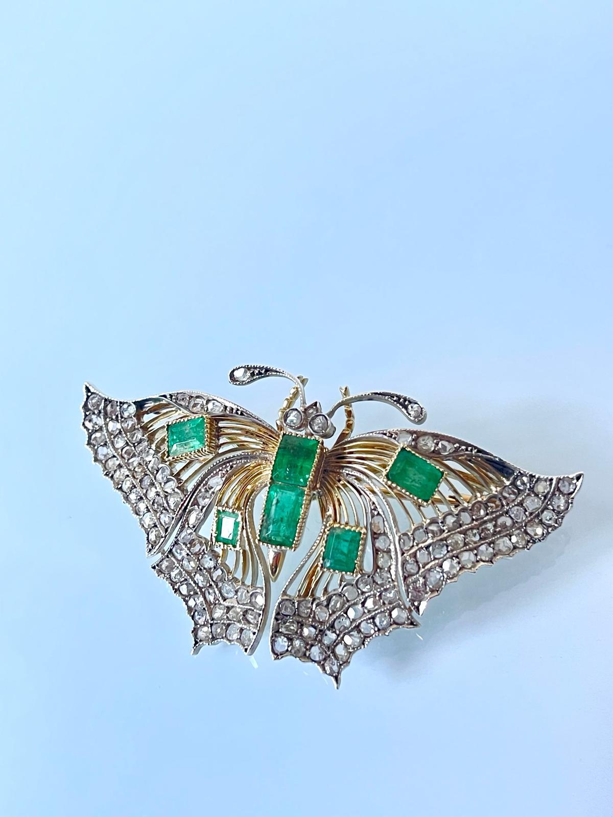Fascinating late Victorian C 1890 butterfly brooch/pendant in 18K yellow gold and silver embellished by 6 natural emeralds and 235 rose cut diamonds.               
This nice antique brooch is large in size, measuring 3.5 x 6.5 cm, it is in a very