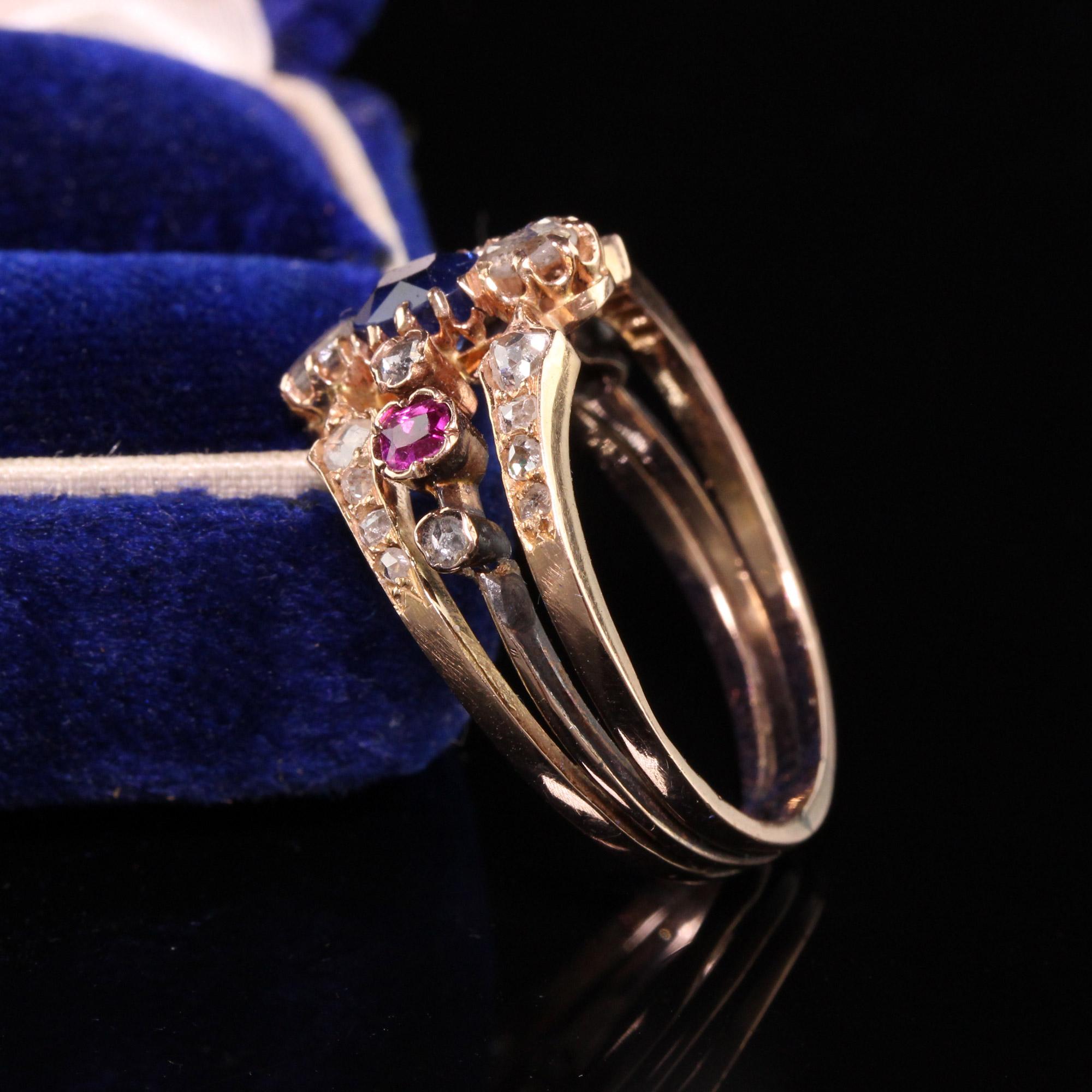 Beautiful Antique Victorian 18K Rose Gold Rose Cut Diamond Sapphire and Ruby Ring. This gorgeous ring has rose cut diamonds set in rose gold with two ruby accents and a center old cushion cut sapphire.

Item #R0775

Metal: 18K Rose Gold

Diamond: