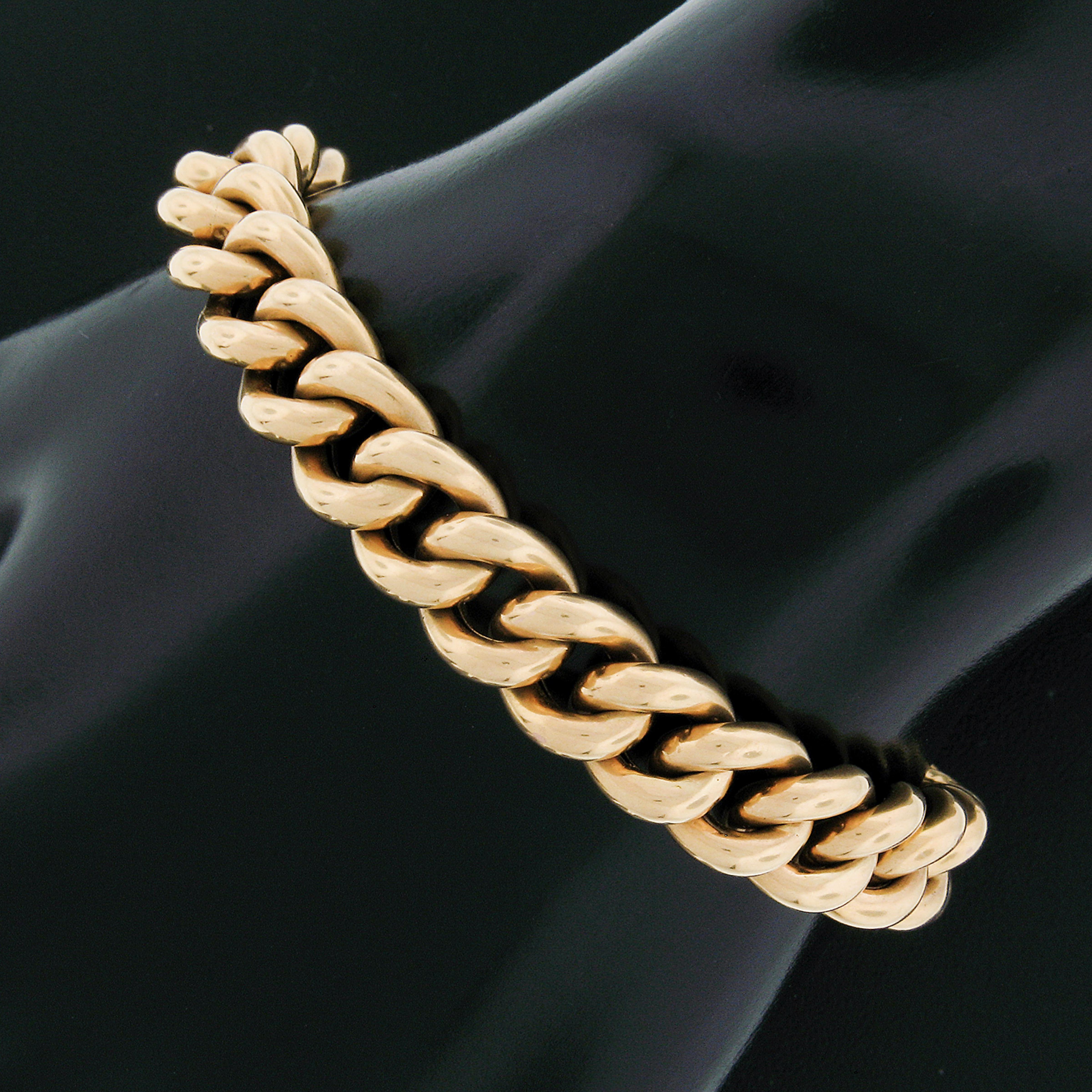 Here we have a beautiful antique chain bracelet that was crafted during the Victorian era from solid 18k gold. This 9.5mm curb link style bracelet has a nice polished finish throughout with a truly bold look on the wrist, yet wears very comfortably
