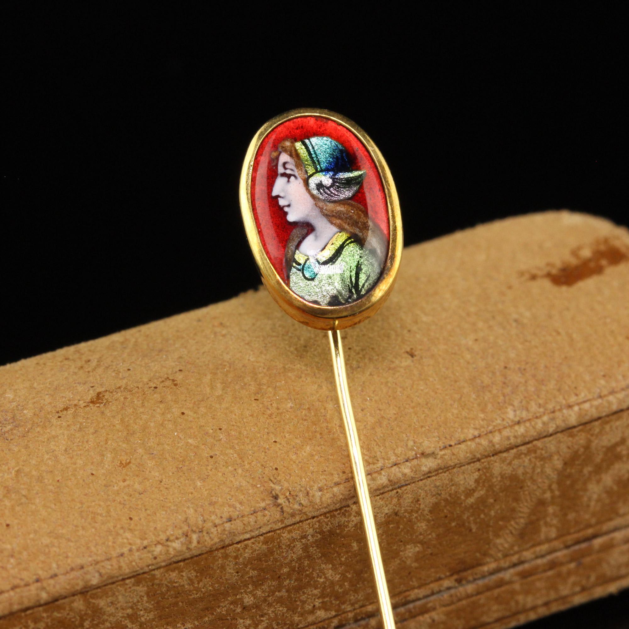 Beautiful Antique Victorian 18K Yellow French Enameled Woman Stick Pin. This gorgeous stick pin is crafted in 18k yellow gold. The pin features a well dressed woman in enamel. The back of the portrait is signed but we can not make out the name. The