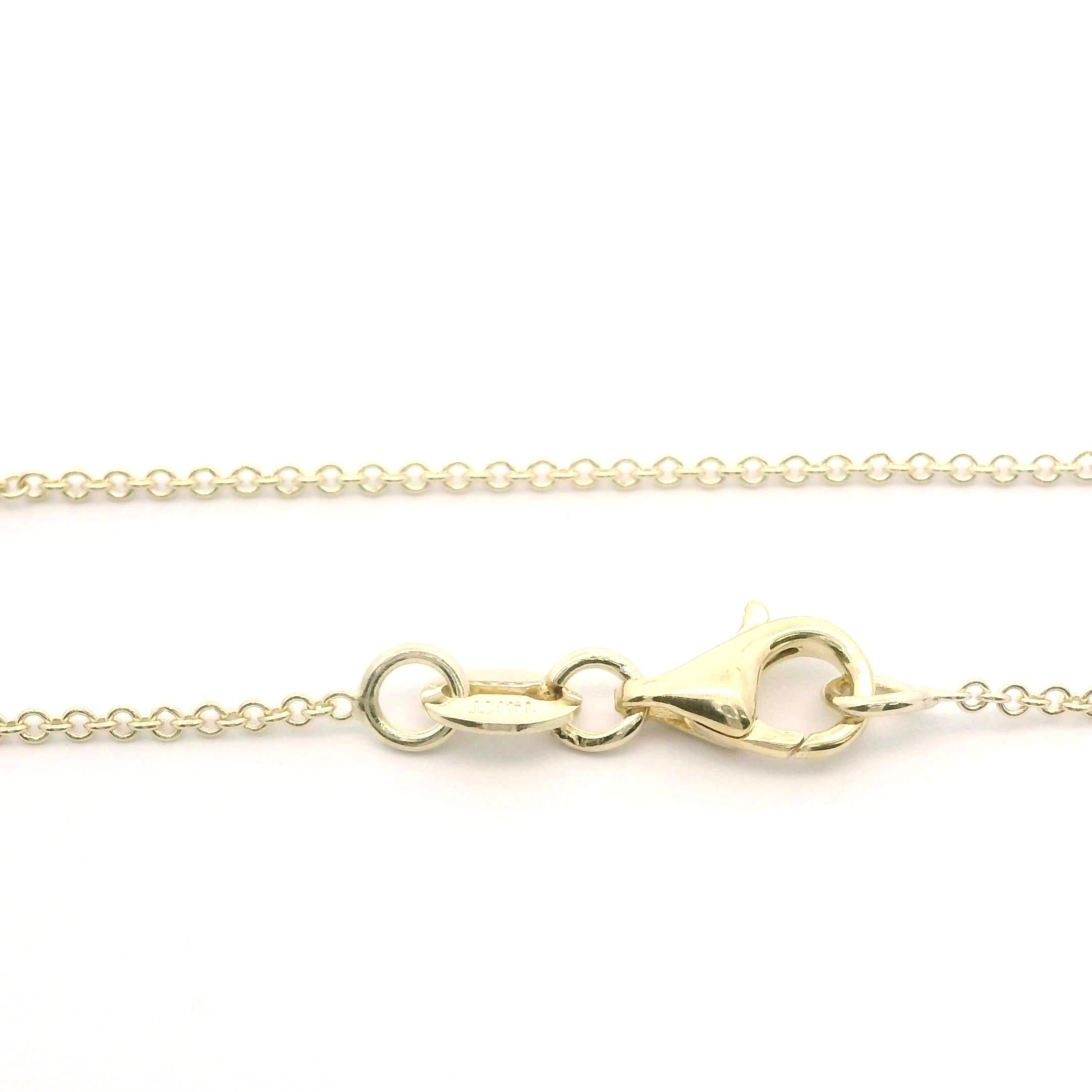 Antiguo collar victoriano de oro amarillo de 18k con halo de rubíes y diamantes de 1,25 quilates Victoriano en venta