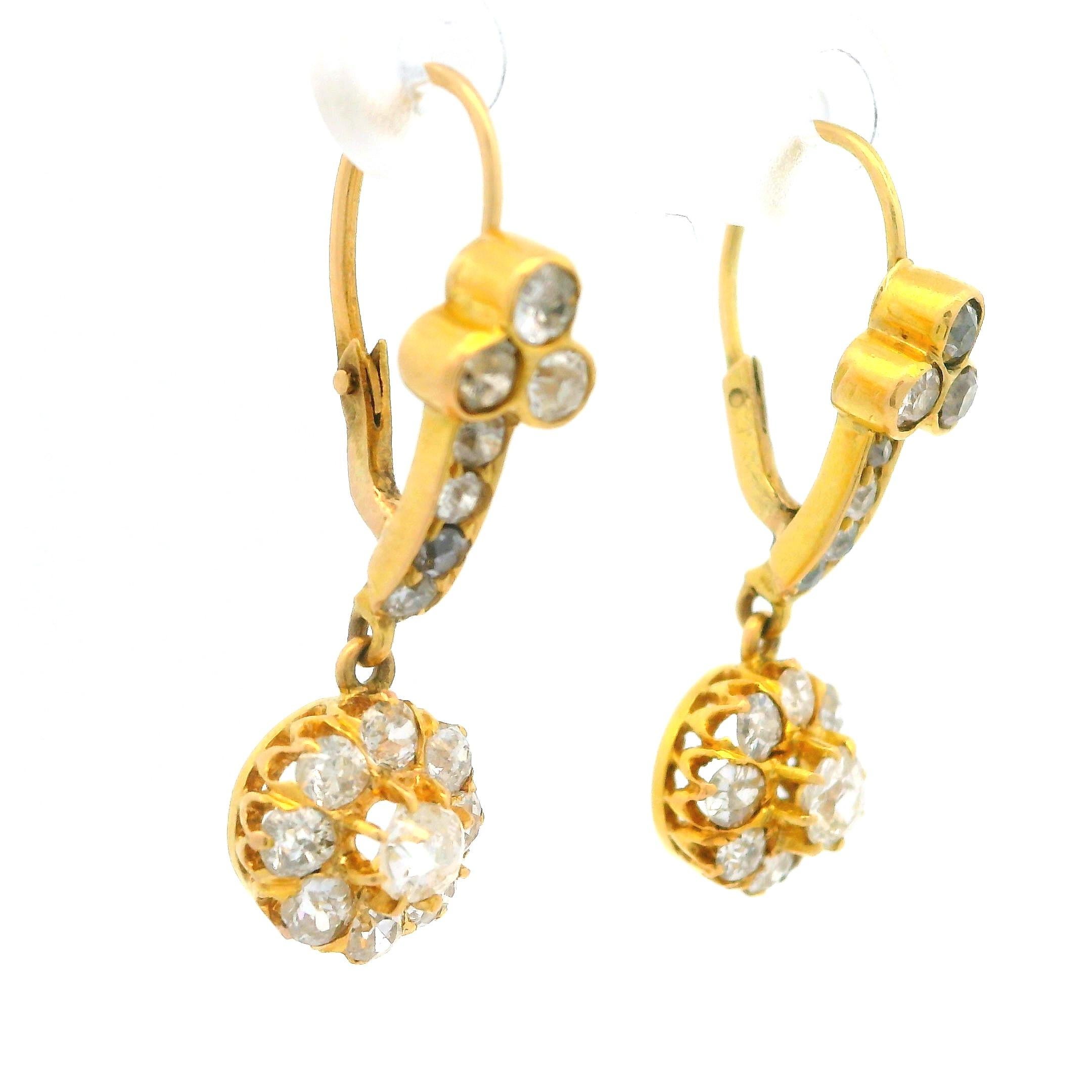 --Stone(s):--
﻿(32) Natural Genuine Diamonds - Old Mine Cut - Prong & Bezel Set - Brilliant & Fiery - 1.25-1.50ctw (approx.)

Material: Solid 18k Yellow Gold All w/ 14K Gold Backs
Weight: 3.60 Grams
Backing: Lever Back Closures (Pierced ears are