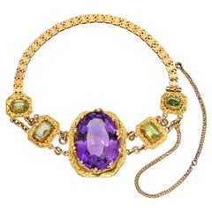 Bracelet victorien ancien en or jaune 18k avec sertissage complexe d'améthyste et de péridot