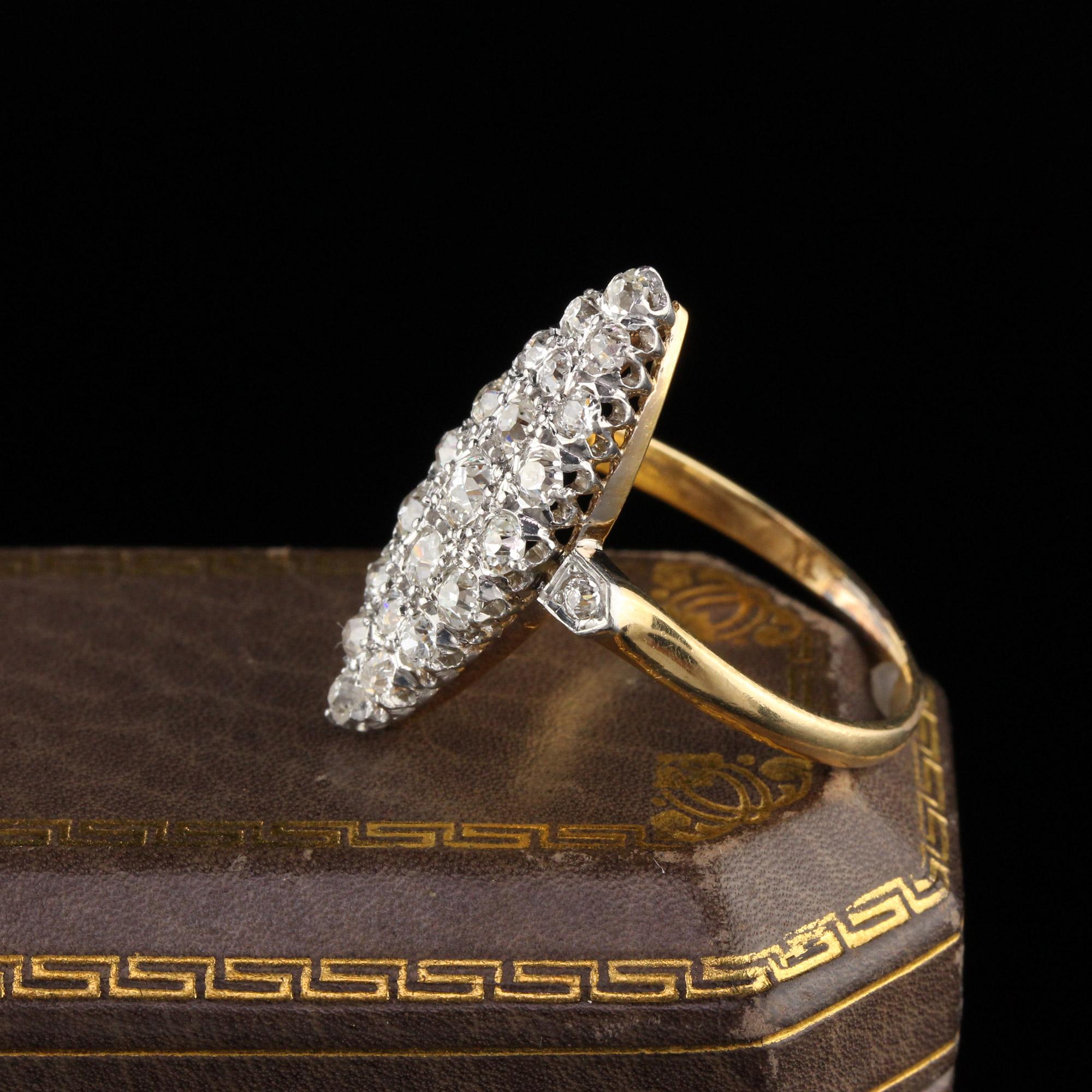 Beautiful Victorian shield ring with old mine cut diamonds. 

Item #R0568

Metal: 18K Yellow Gold & Platinum Top

Weight: 4.6 Grams

Total Diamond Weight: Approximately 1.25 cts

Diamond Color: H

Diamond Clarity: VS1

Ring Size: 8.5

This ring can
