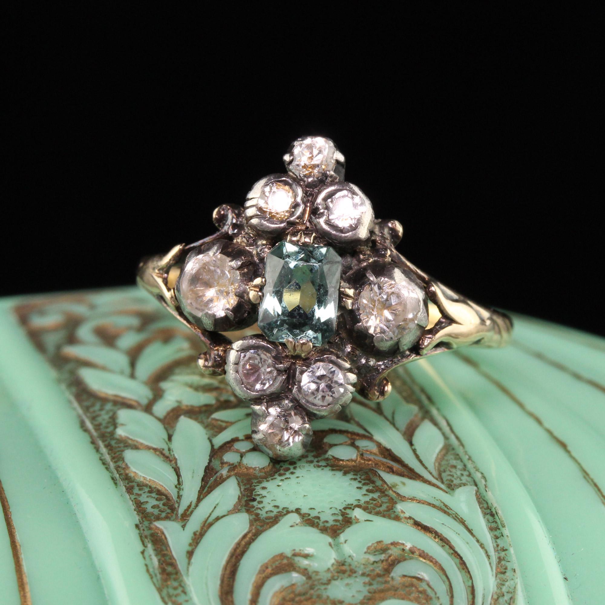 Beautiful Antique Victorian 18K Yellow Gold and Silver Top French Paste Ring. This gorgeous Victorian ring has white french paste with a green stone we believe to be paste as well. It is a beautiful ring with silver top.

Item #R1194

Metal: 18K