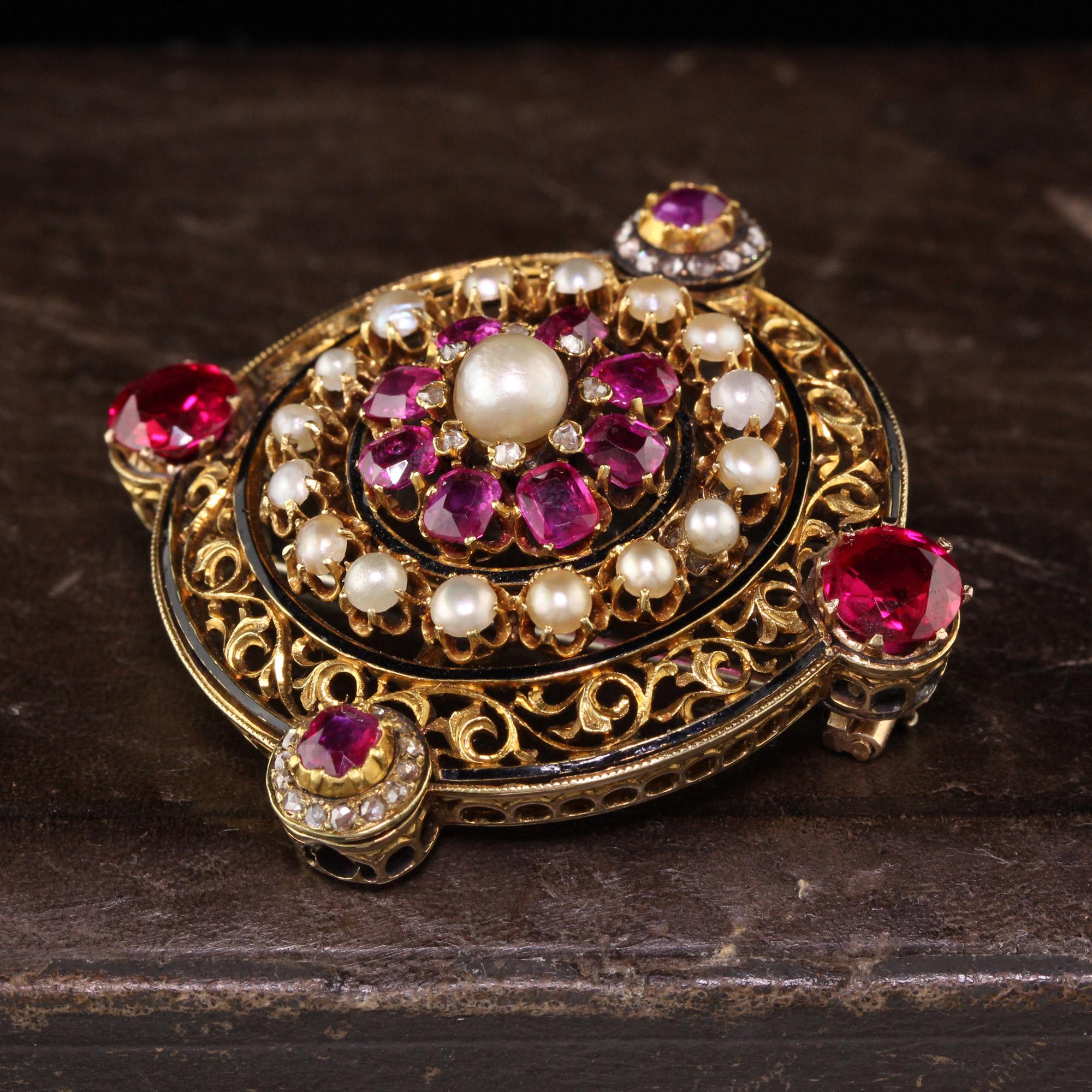 Gorgeous Antique Victorian 18K Yellow Gold Black Enamel Ruby Pearl Diamond Pin. This unbelievable pin features gorgeous rubies, natural pearls and rose cut diamonds. The larger side rubies are believed to by synthetic rubies. 

Item #P0101

Metal: