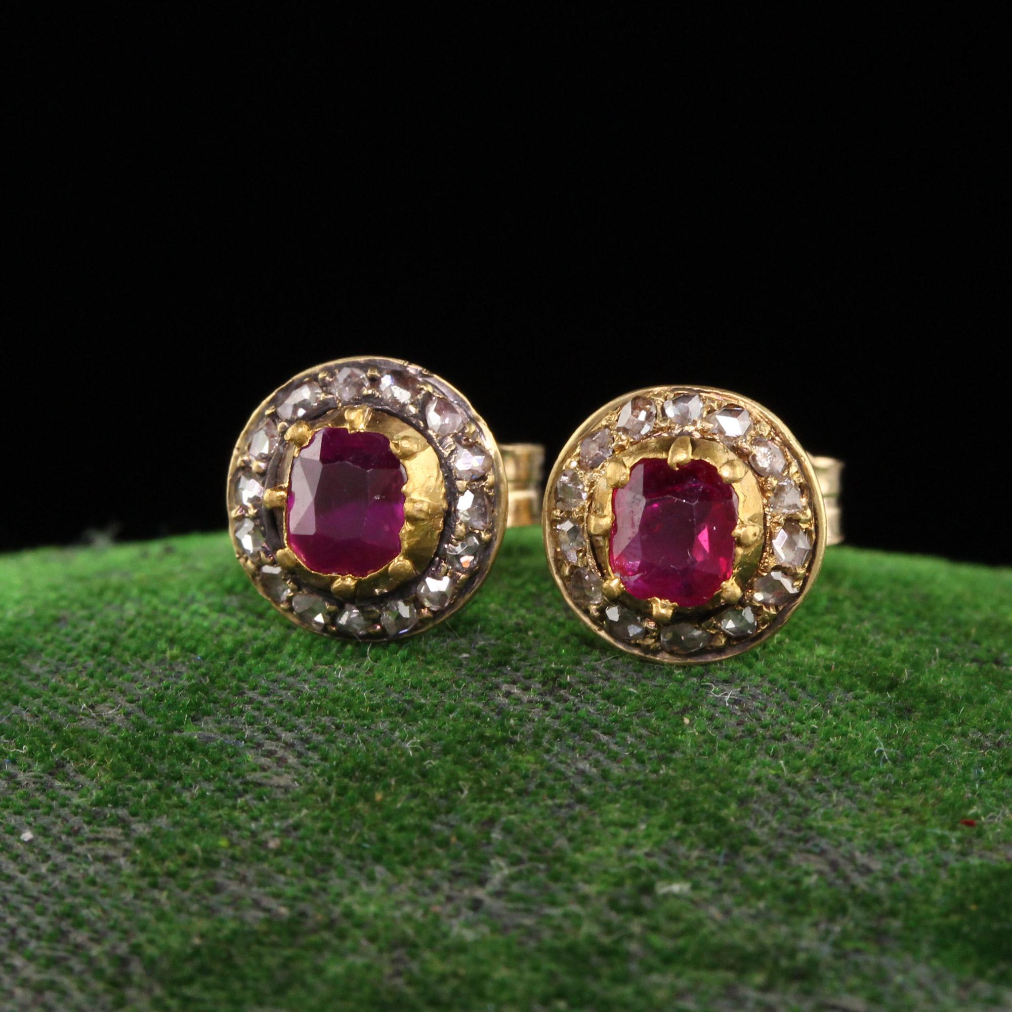Beautiful Antique Victorian 18K Yellow Gold Burma Ruby and Diamond Stud Earrings. This beautiful pair of earrings are crafted in 18k yellow gold. The center holds natural burma rubies and they are surrounded by rose cut diamonds. They are set in