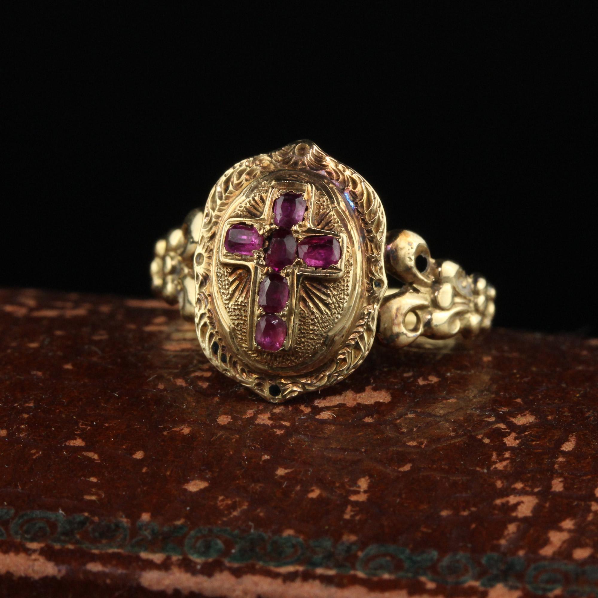 Beautiful Antique Victorian 18K Yellow Gold Burmese Ruby Cross Ring - Size 4 3/4. This beautiful ring is crafted in 18k yellow gold. The center has a cross that has natural Burmese rubies on it. The ring sits low on the finger and is beautifully