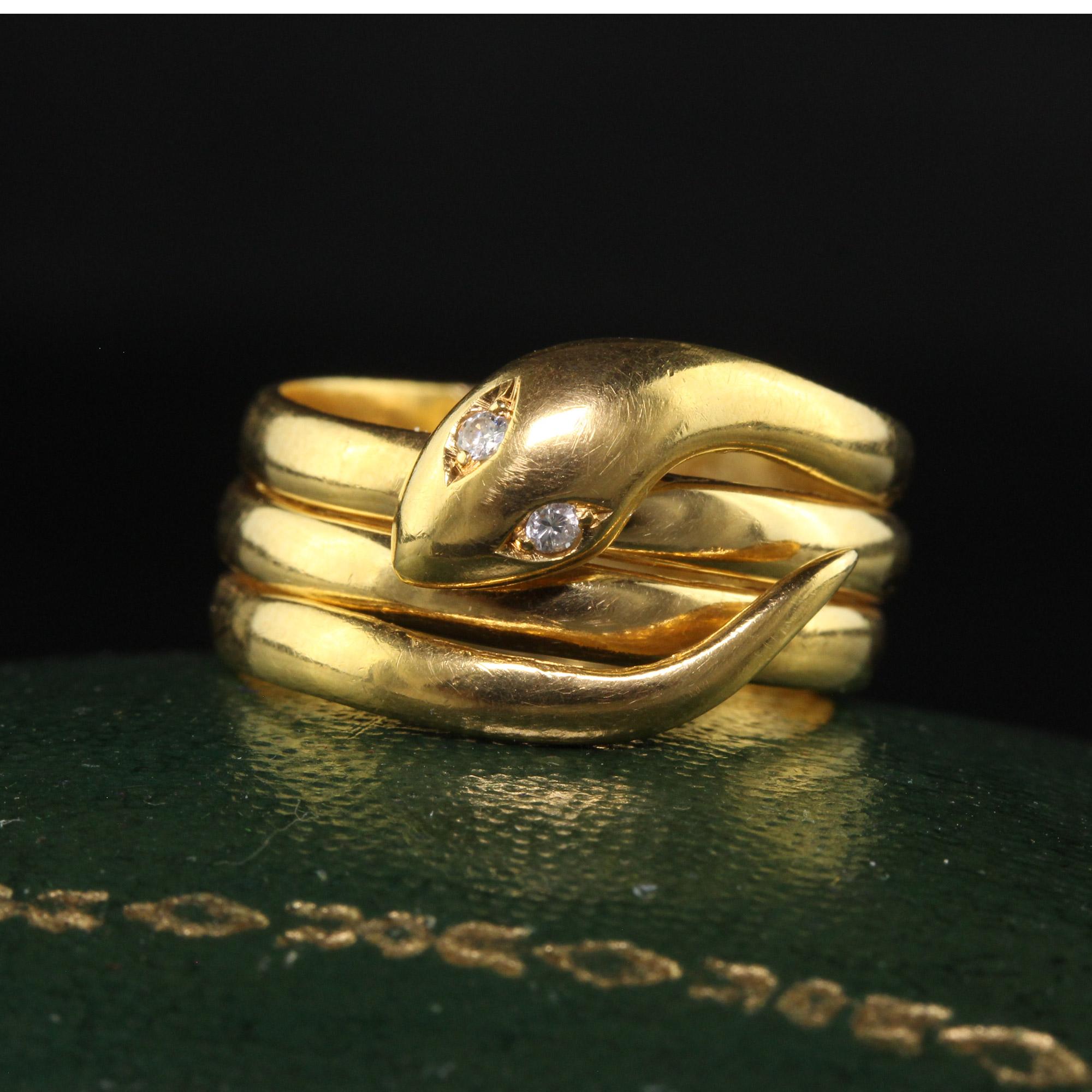 Beautiful Antique Victorian 18K Yellow Gold Diamond Coiled Snaked Ring. This gorgeous Victorian snake ring is crafted in 18k yellow gold. The eyes of the snake are diamonds and the ring is in good condition. The ring sits low on the finger and is