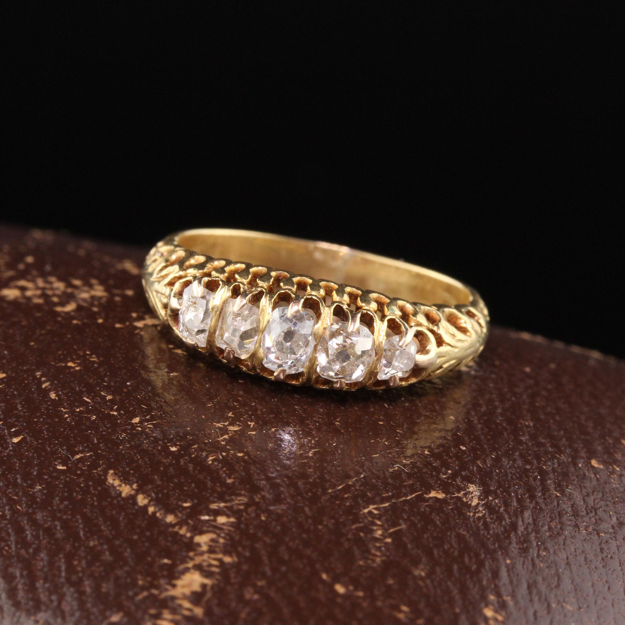 Beautiful classic Victorian half hoop band in yellow gold with 5 graduating old mine cut diamonds. The perfect wedding band or anniversary band!

#R0355

Metal: 18K Yellow Gold 

Weight: 2.9 Grams

Total Diamond Weight: Approximately 0.60 cts old