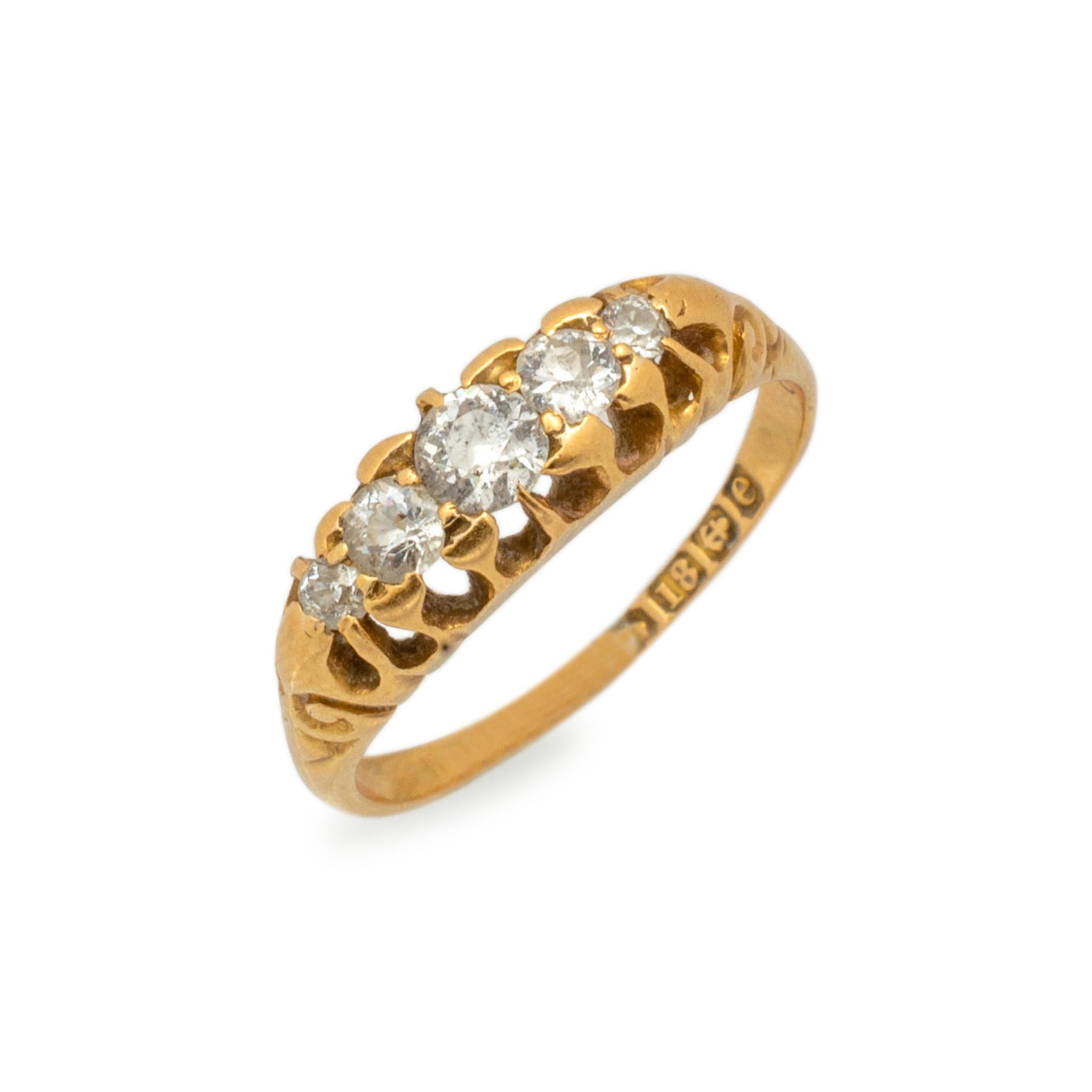 Gender: Unisex

Metal Type: 18K Yellow Gold

Size: 6

Shank Width: 5.10mm tapering to 1.35mm

Weight: 2.87 grams

Unisex satin finished 18K yellow gold five-across diamond cocktail ring with a half round shank.

Pre-owned in excellent condition.