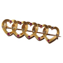 Antica spilla vittoriana in oro giallo 18 carati con diamante e rubino a forma di cuore