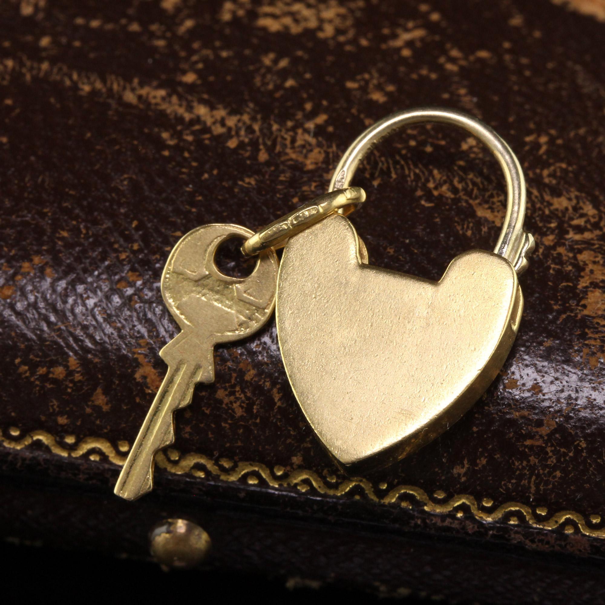 Beautiful Antique Victorian 18K Yellow Gold Heart Lock and Key Pendant Charm. This amazing antique Victorian heart pendant charm is crafted in 18k yellow gold. The charm has a locking mechanism that works and a key that is connected to it but is not