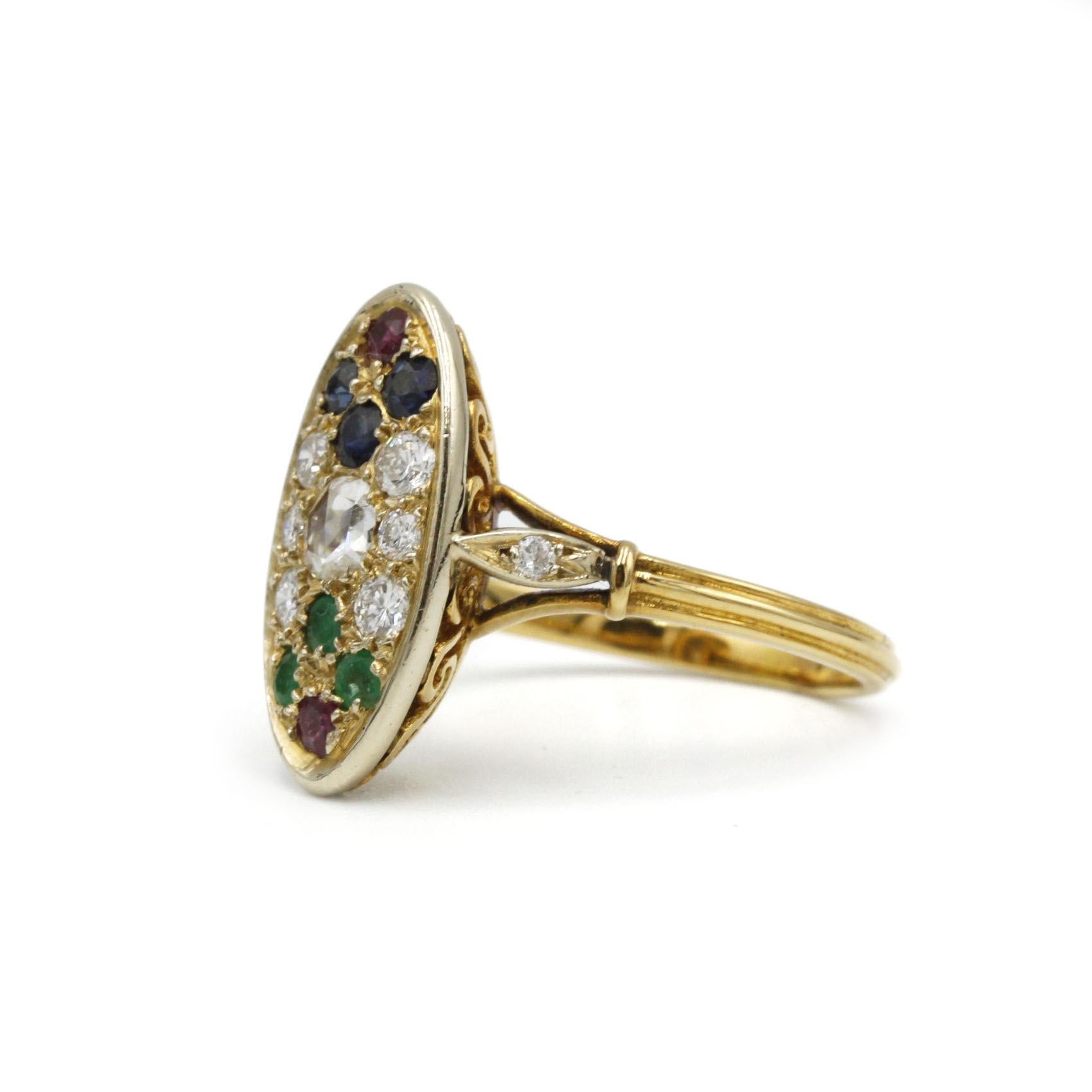 A stunning example of late Victorian jewelry design, this 18K yellow gold (750‰) navette-shaped cluster ring showcases a handcrafted rose-cut diamond at its heart (approx. 0.25 ct), encircled by six bright old mine diamonds, three deep-blue