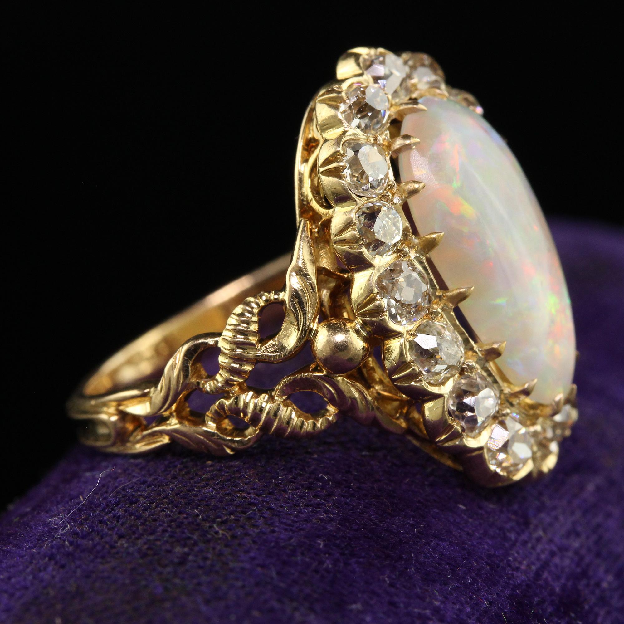 Antique Victorian 18K Yellow Gold Natural Australian Opal Diamond Halo Ring In Good Condition For Sale In Great Neck, NY