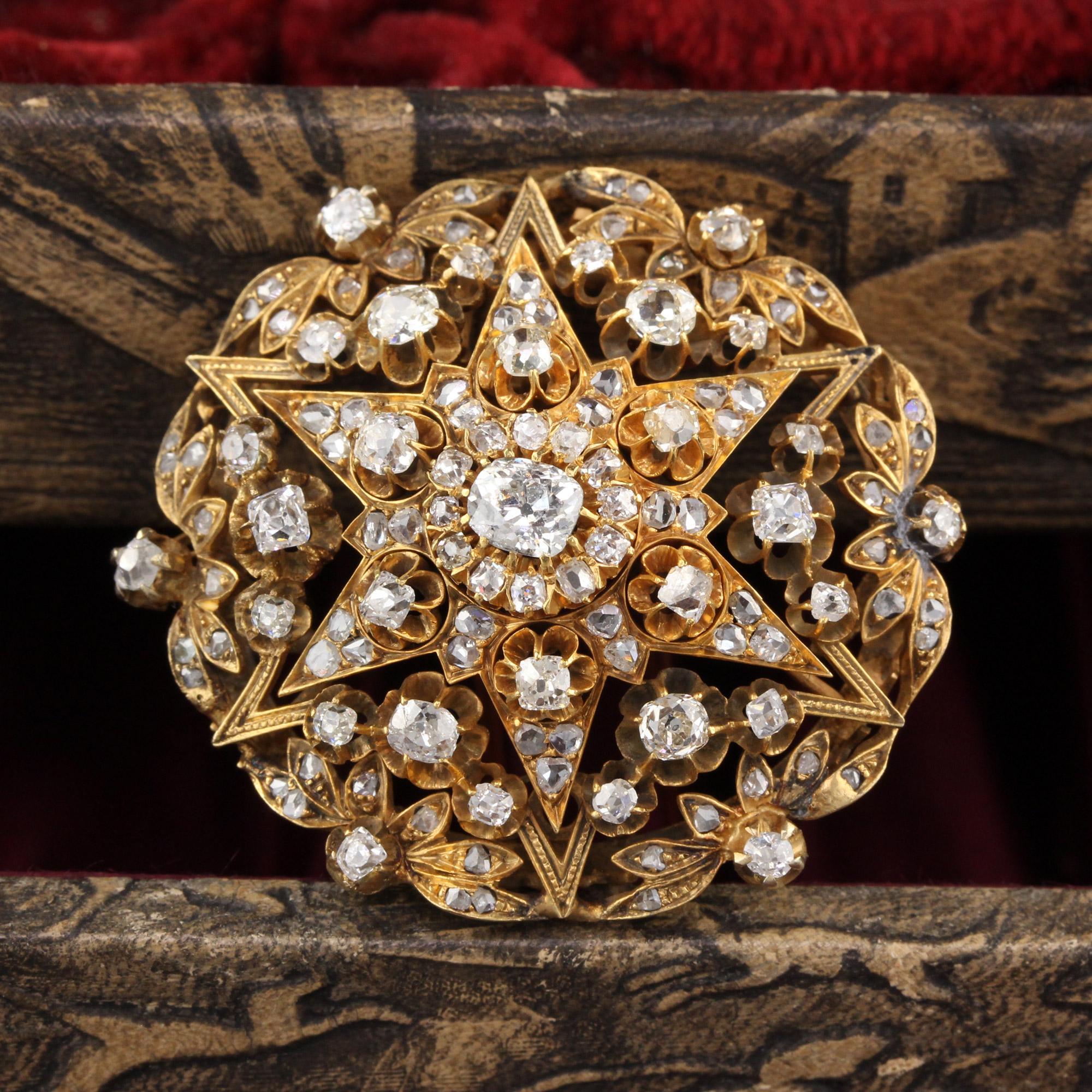 Gorgeous antique gold brooch with old cut diamonds. 

Can be converted to a pendant for a $50 fee! 

Metal: 18K Yellow Gold 

Weight: 17.9 Grams 

Diamonds: Approximately 4 cts

Measurements: 42 x 39 mm