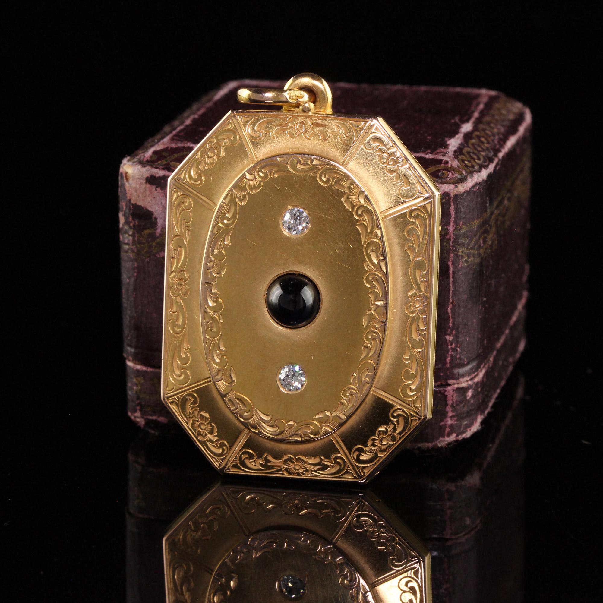 Beautiful Antique Victorian 18K Yellow Gold Old Euro Diamond and Sapphire Locket Pendant. This incredible locket is crafted in 18k yellow gold. The center holds a natural cabochon sapphire and has old european cut diamond above and below it. The