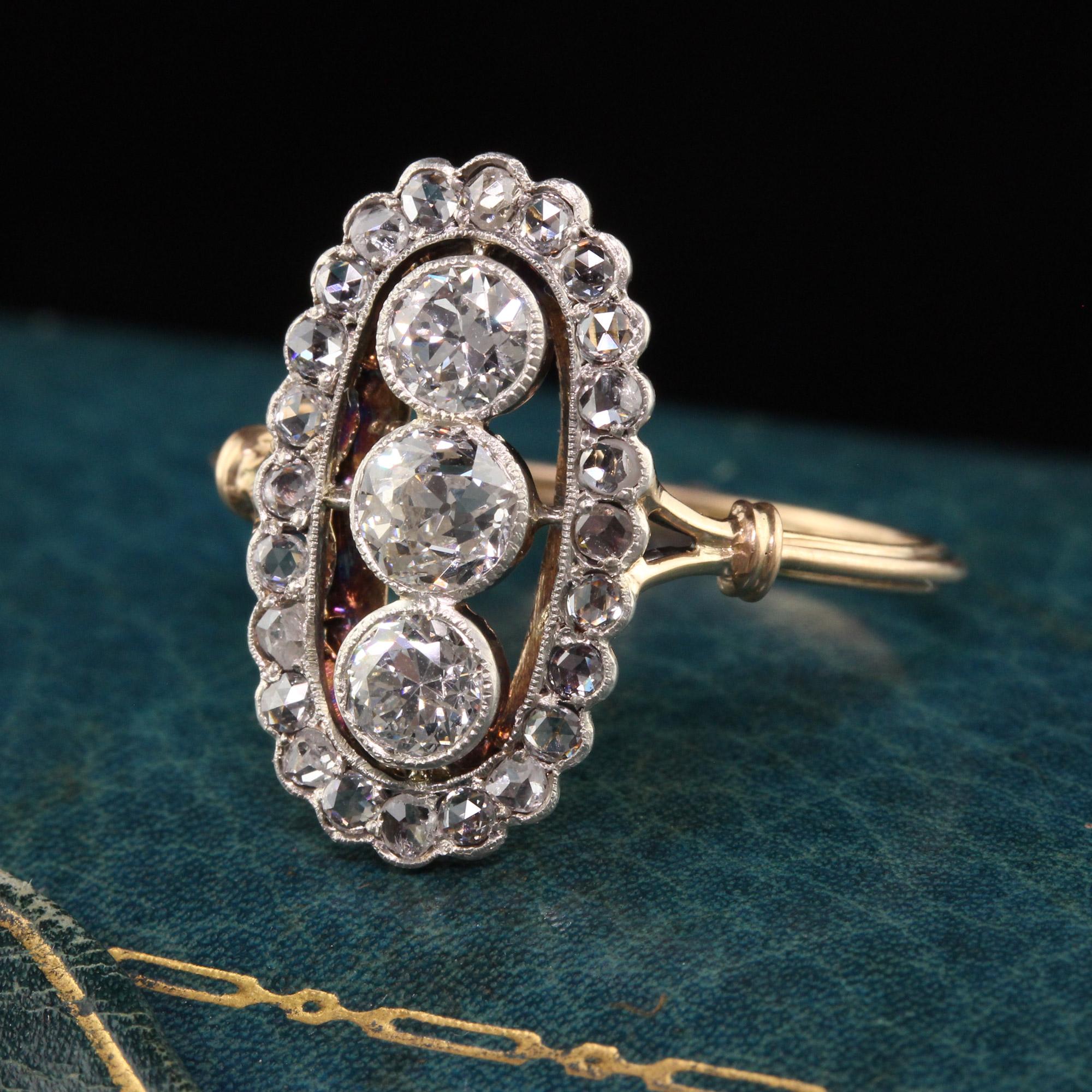 Beautiful Antique Victorian 18K Yellow Gold Old European Rose Cut Diamond Ring. This gorgeous Victorian ring features three beautiful old european cut diamonds in the center and surrounded by rose cut diamonds. It is an amazing piece of