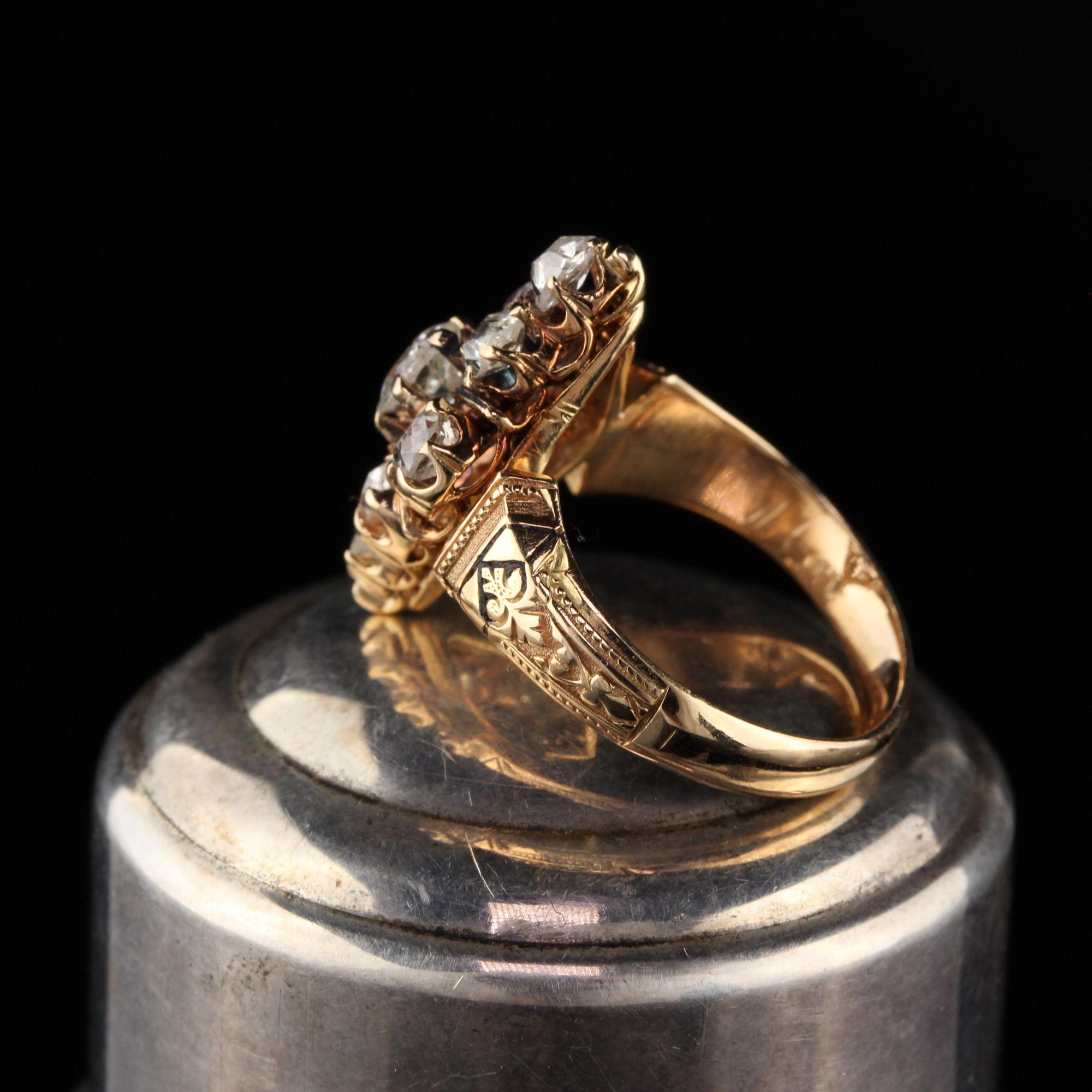 Gorgeous Victorian shield ring with 9 old mine cut diamonds. 

Item #R0562

Metal: 18K Yellow Gold

Weight: 5.7 Grams

Total Diamond Weight: Approximately 1.50 cts

Diamond Color: I

Diamond Clarity: SI1

Ring Size: 6.25 

This ring can be sized for