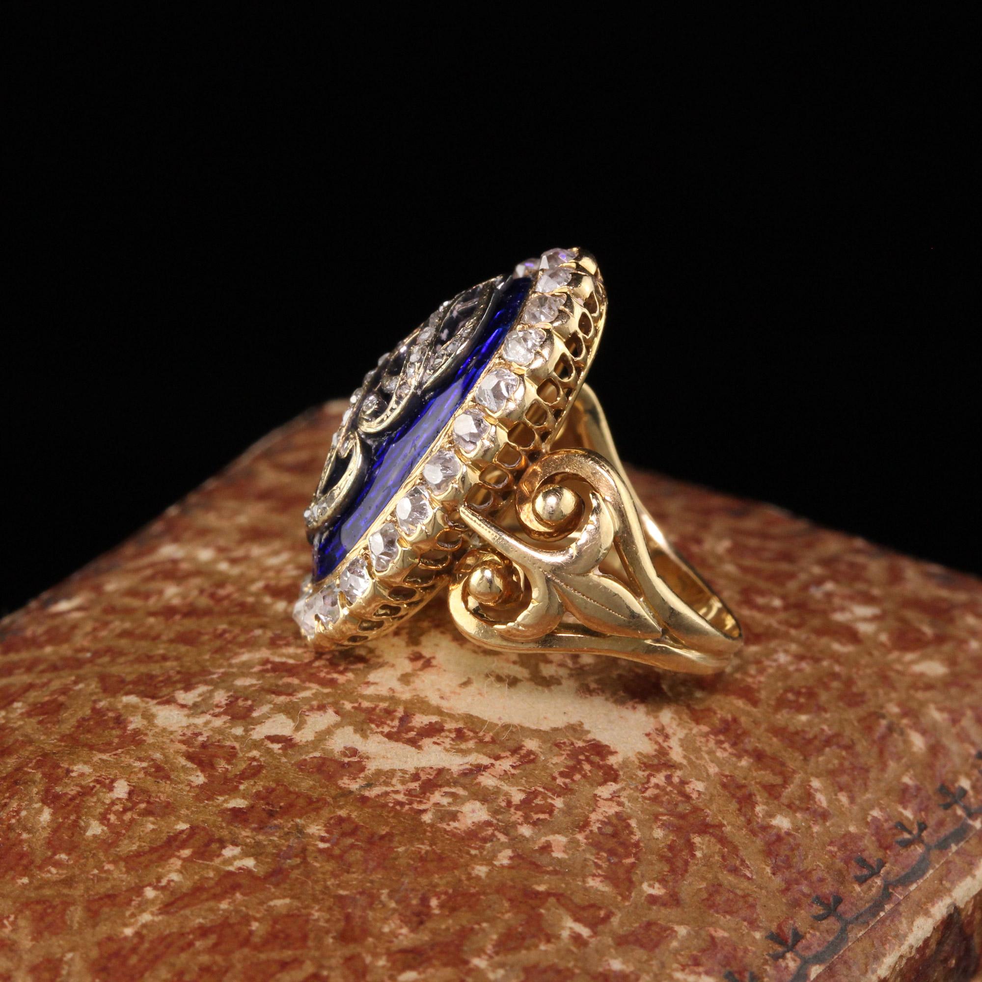 Gorgeous Antique Victorian 18K Yellow Gold Old Mine Diamond and Enamel Cocktail Ring. This gorgeous ring has old mine cut diamonds going around the center blue enamel with rose cut diamonds filling in the center design.

Item #R0718

Metal: 18K