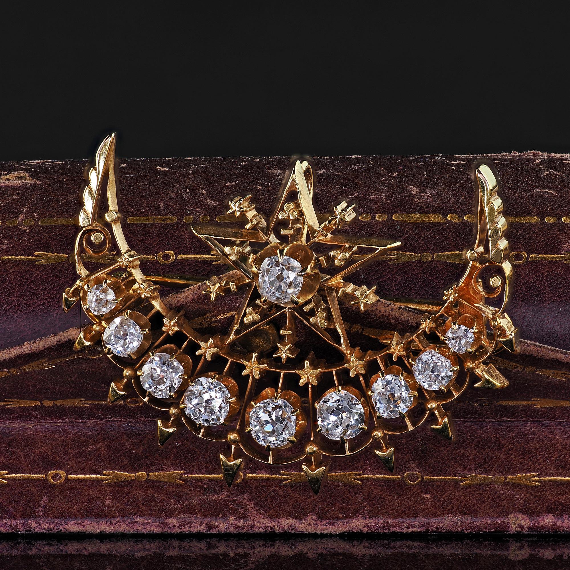 Beautiful Antique Victorian 18K Yellow Gold Old Mine Diamond Celestial Crescent Pin Brooch. This incredible Victorian diamond celestial crescent pin is crafted in 18k yellow gold. The pin features chunky old mine cut diamonds set across the crescent