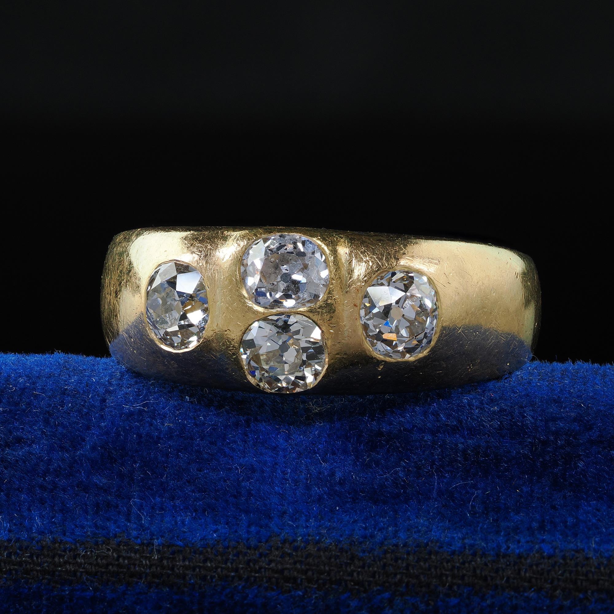 Beautiful Antique Victorian 18K Yellow Gold Old Mine Diamond Four Stone Flush Set Ring. This beautiful Antique Victorian old mine cut diamond ring is crafted in 18k yellow gold. This ring features four beautiful chunky old mine cut diamonds that are