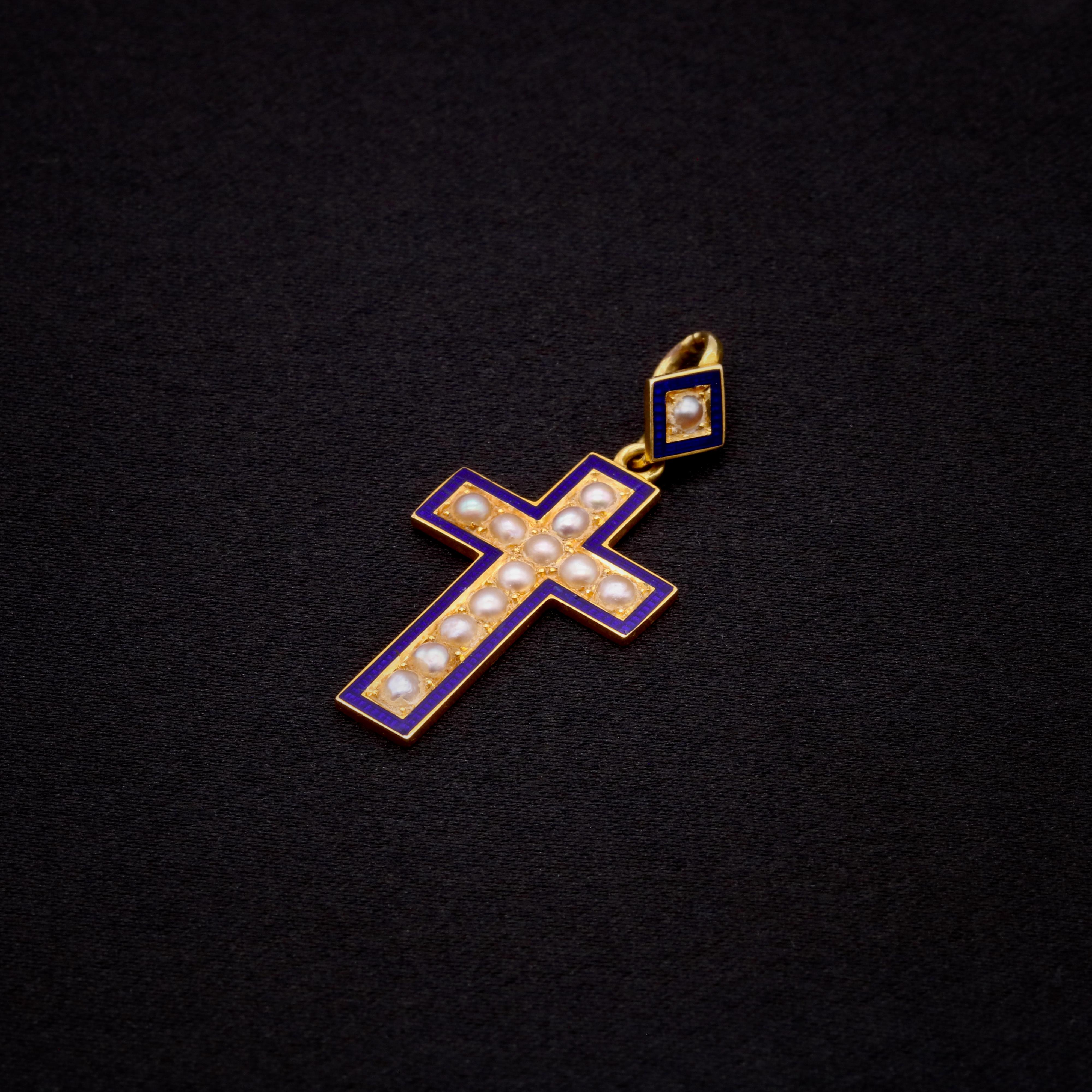 A Victorian pearl, enamel, and yellow gold pendant, comprising thirteen half seed pearls, in 18 karat yellow gold. 

My favourite thing about this Victorian Yellow Gold Pearl and Enamel Cross Pendant is the striking design. What’s yours? Perhaps the