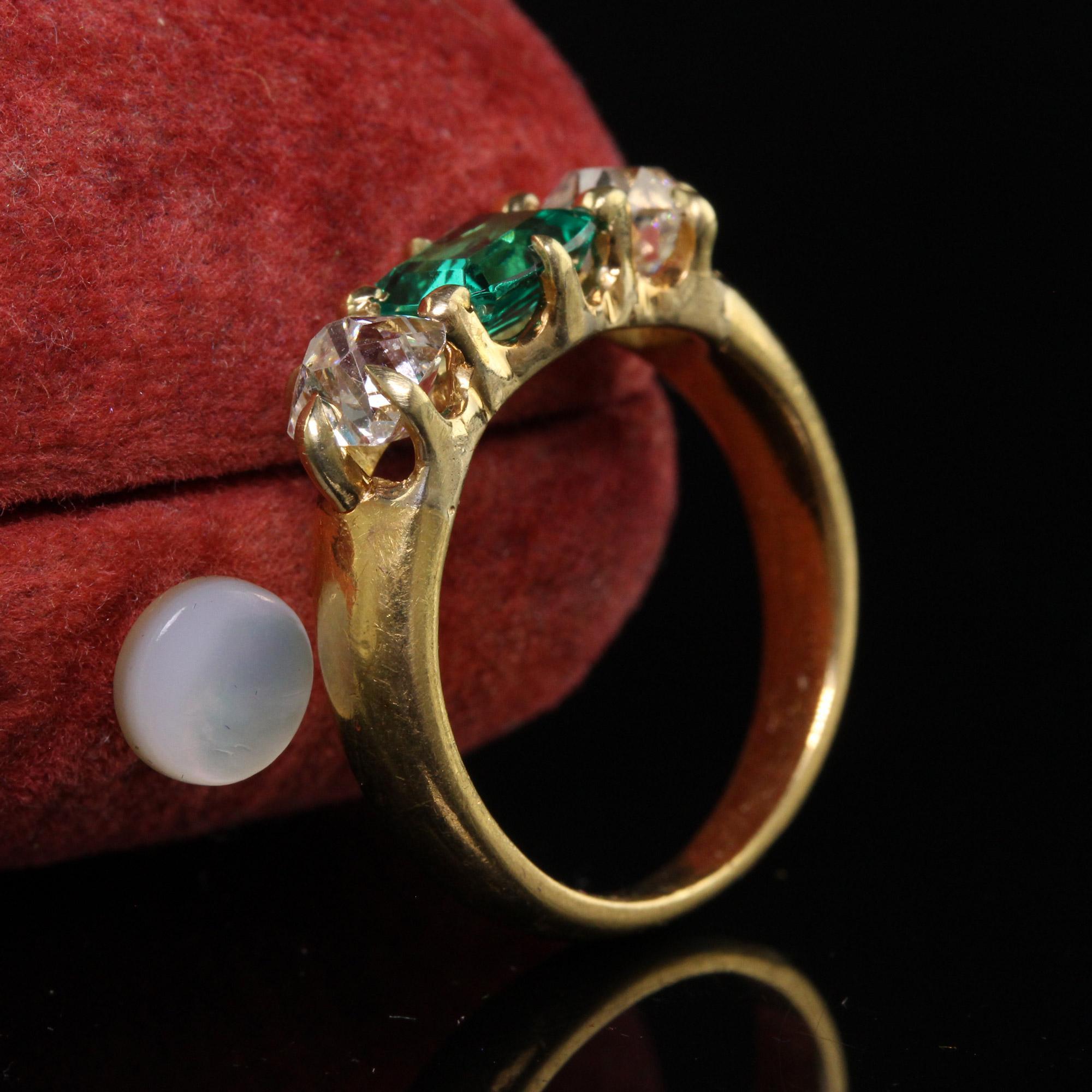 Emerald Cut Antique Victorian 18K Yellow Gold Peruzzi Cut Diamond Emerald Three Stone Ring