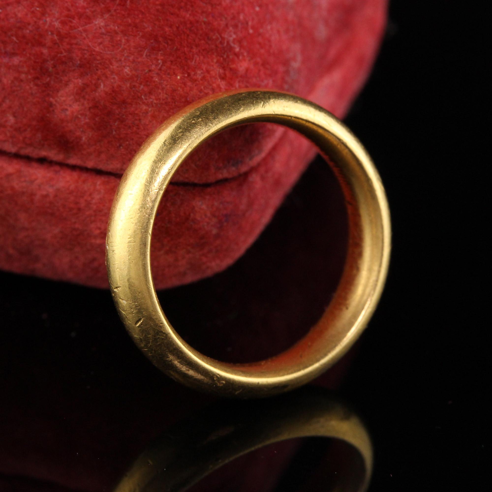 Beautiful Antique Victorian 18K Yellow Gold Plain Wide Engraved Wedding Band. This simple beautifully crafted band is thick and wide. The inside of the band is engraved but we can only make out the 