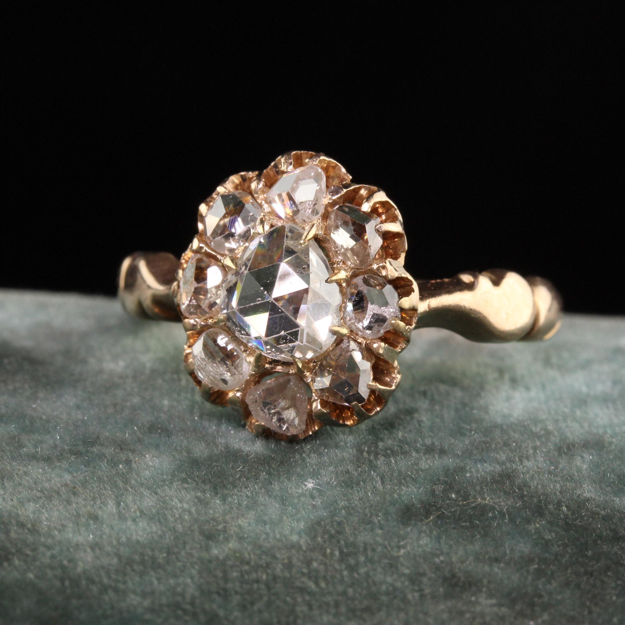 Beautiful Antique Victorian 18K Yellow Gold Rose Cut Diamond Engagement Ring. This gorgeous engagement ring has a domed rose cut diamond in the center of a low profile Victorian mounting surrounded by more rose cut diamonds.

Item #R1066

Metal: 18K