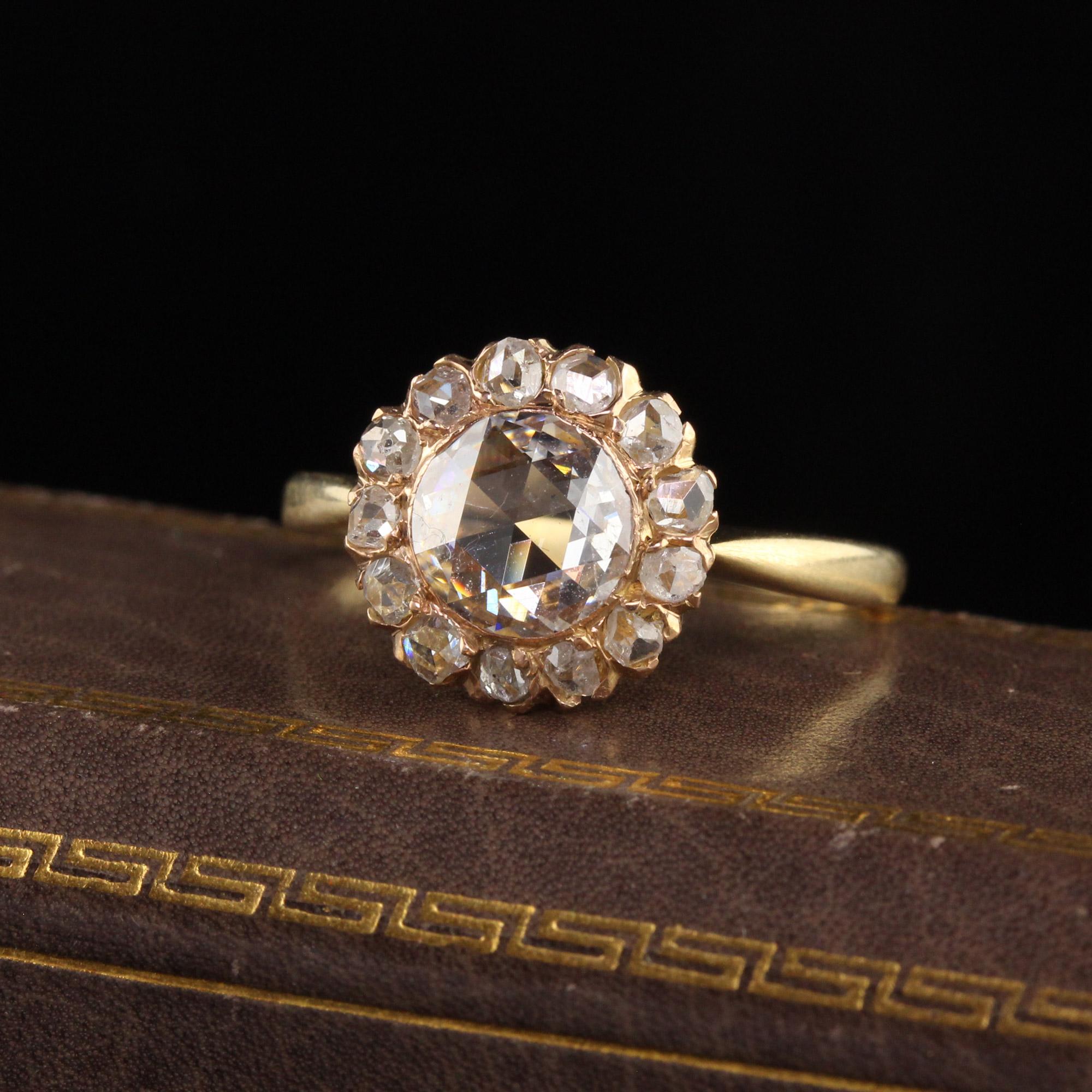 Beautiful Antique Victorian 18K Yellow Gold Rose Cut Diamond Engagement Ring. This incredible engagement ring is crafted in 18K yellow gold and has a GIA certified domed rose cut in the center of a gorgeous victorian mounting surrounded by rose cut
