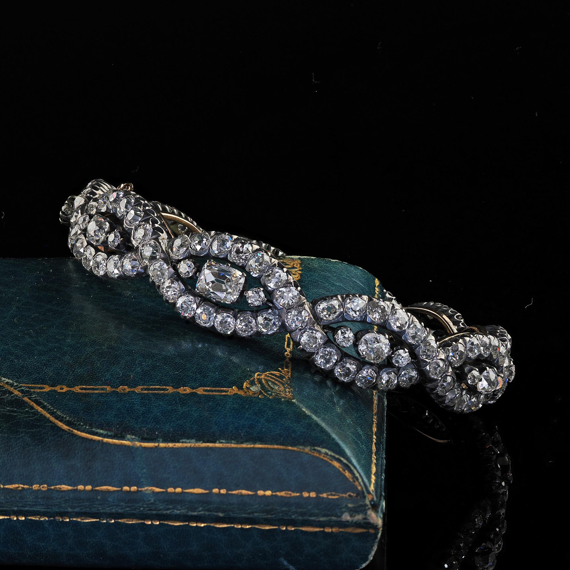 Beautiful Antique Victorian 18K Yellow Gold Silver Old Mine Diamond Eternity Bangle. This unbelievable antique Victorian diamond bangle bracelet is crafted in 18k yellow gold and silver. This gorgeous bangle features chunky old mine cut diamonds set