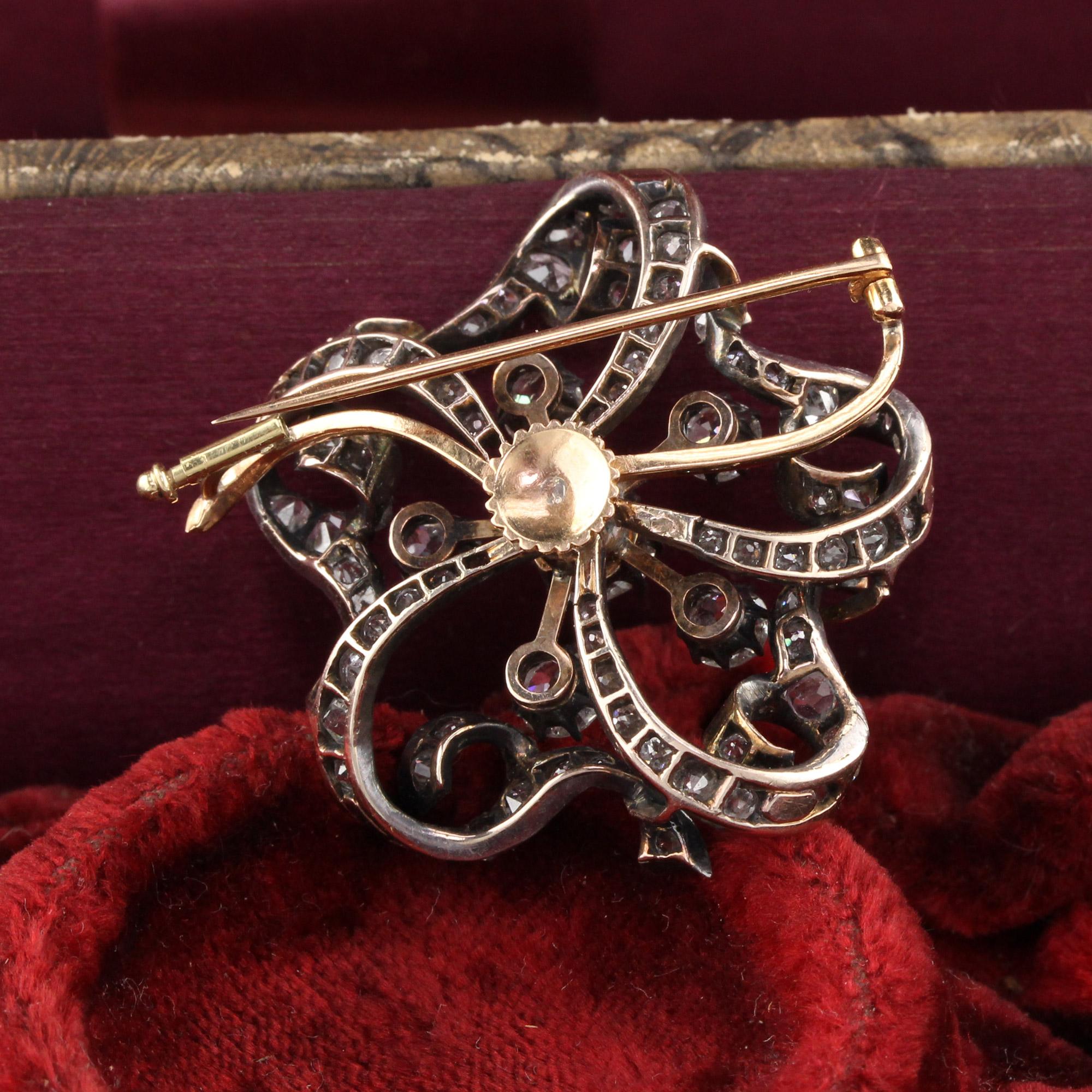 Old European Cut Antique Victorian 18 Karat Gold Silver Top Flower Brooch with Old Cut Diamonds