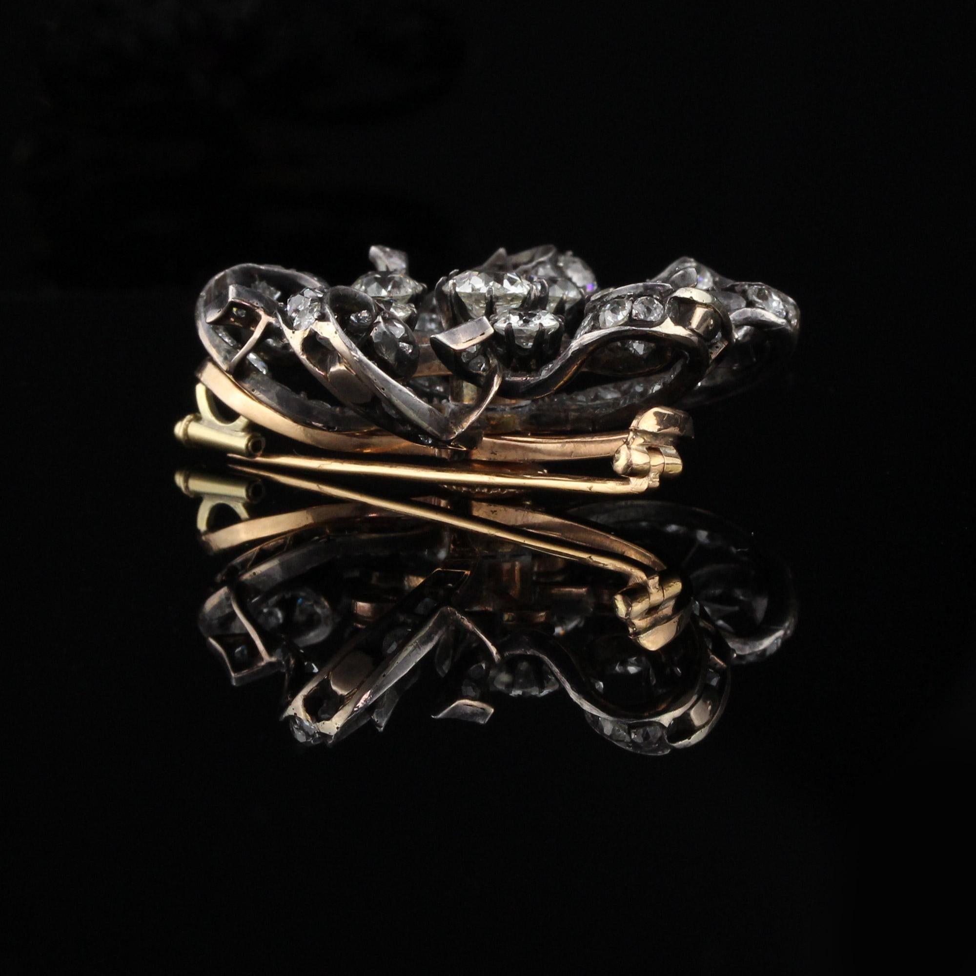 Antique Victorian 18 Karat Gold Silver Top Flower Brooch with Old Cut Diamonds In Good Condition In Great Neck, NY