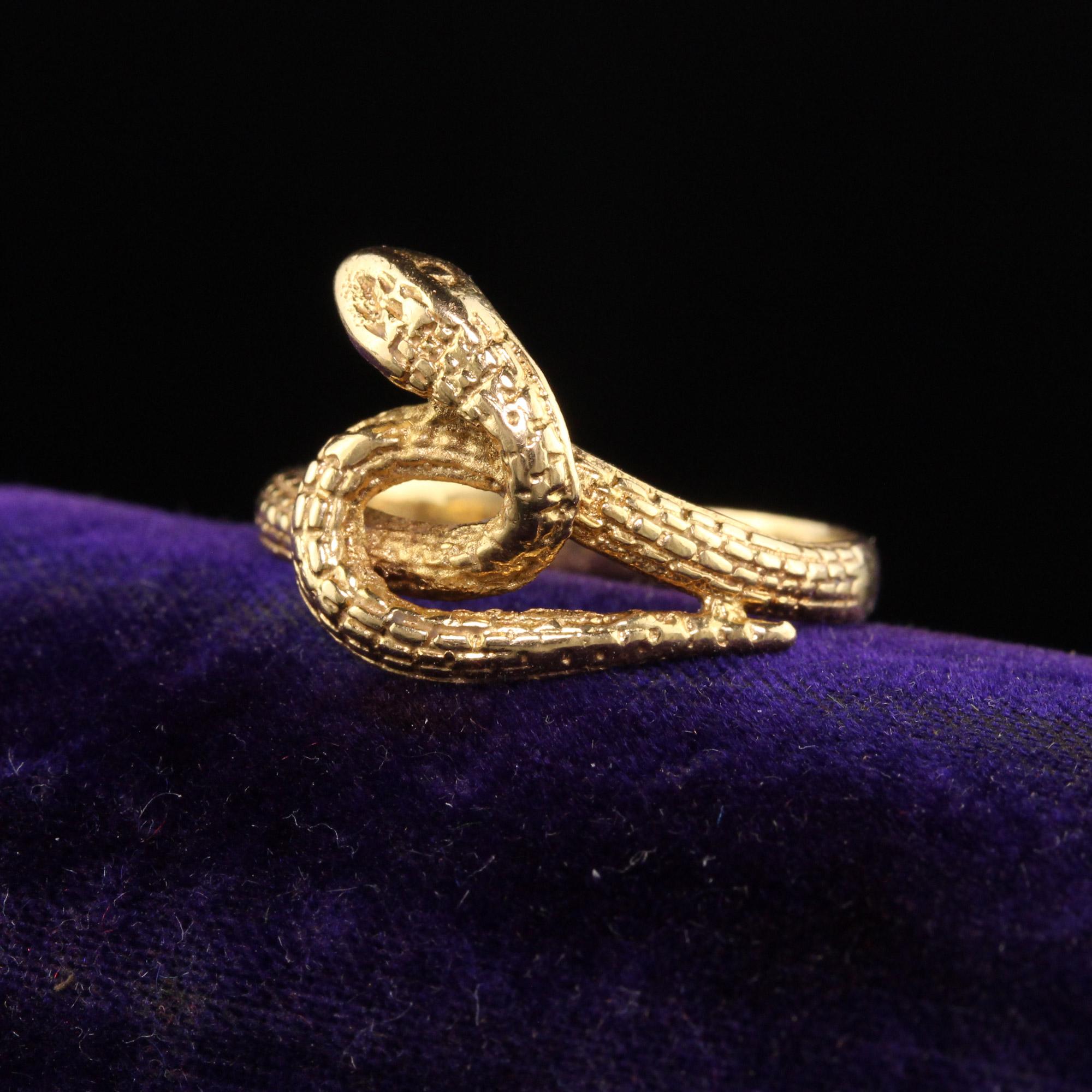 Beautiful Antique Victorian 19K Yellow Gold Engraved Snake Ring. This beautiful snake ring is crafted in 19k yellow gold and has hallmarks on the outside of the shank. It is in great condition and the scale engravings are nice a visible.

Item