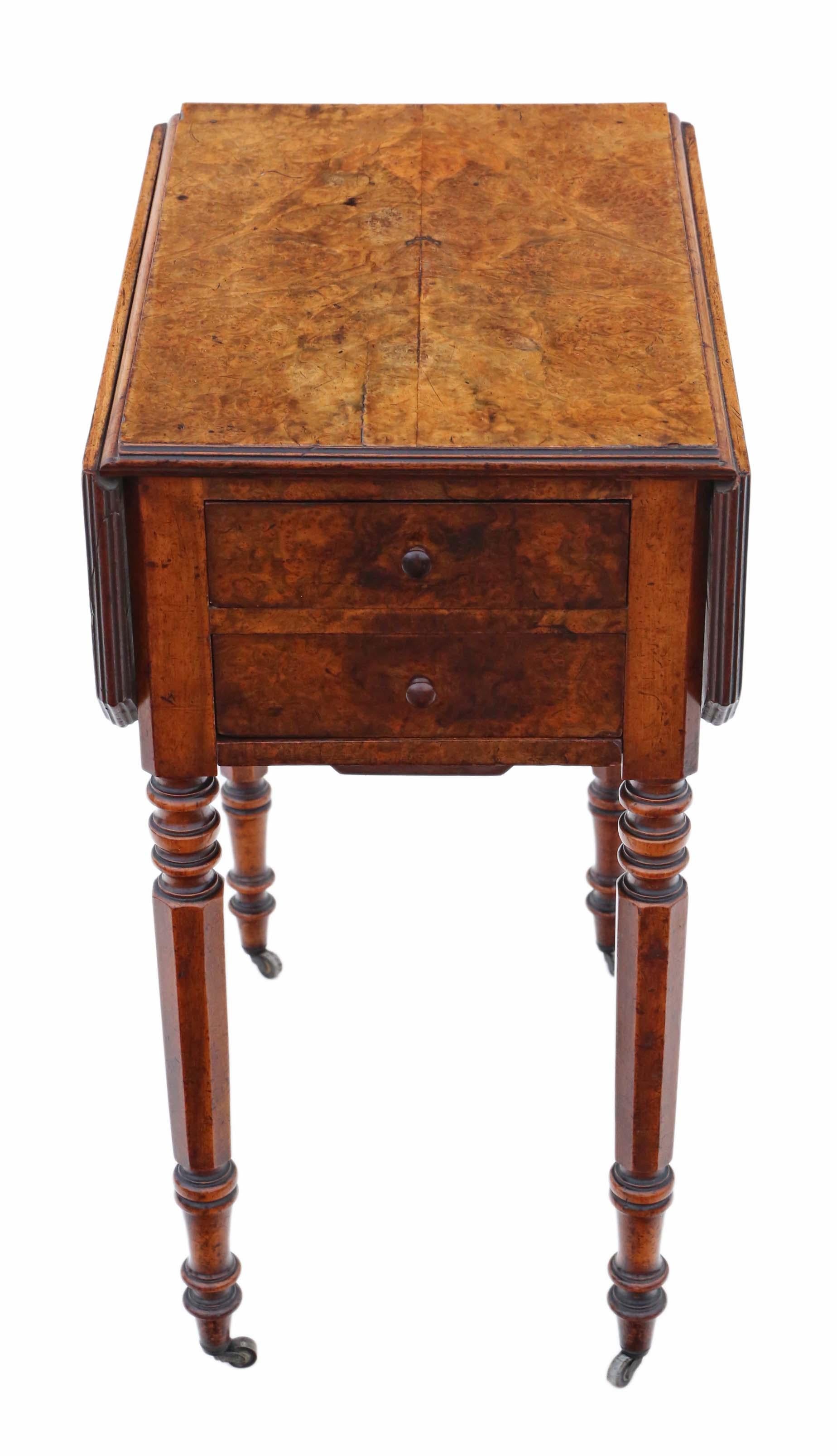 Antique fine quality Victorian 19th Century C1880 burr walnut drop leaf work table.

Two drawers to each side and a sewing compartment, all of which slide freely. Beautiful octagonal legs termination in period castors.

No loose joints. Full of
