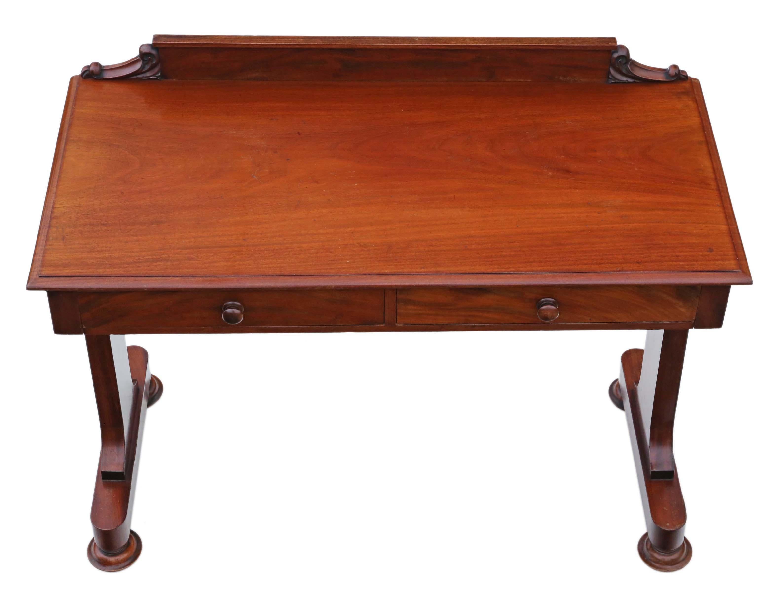 Antique fine quality Victorian 19th century mahogany writing desk dressing table.

Solid and no loose joints and no woodworm. Full of age, character and charm. The ash lined drawers slide freely. A rare and attractive find.

Would look great in